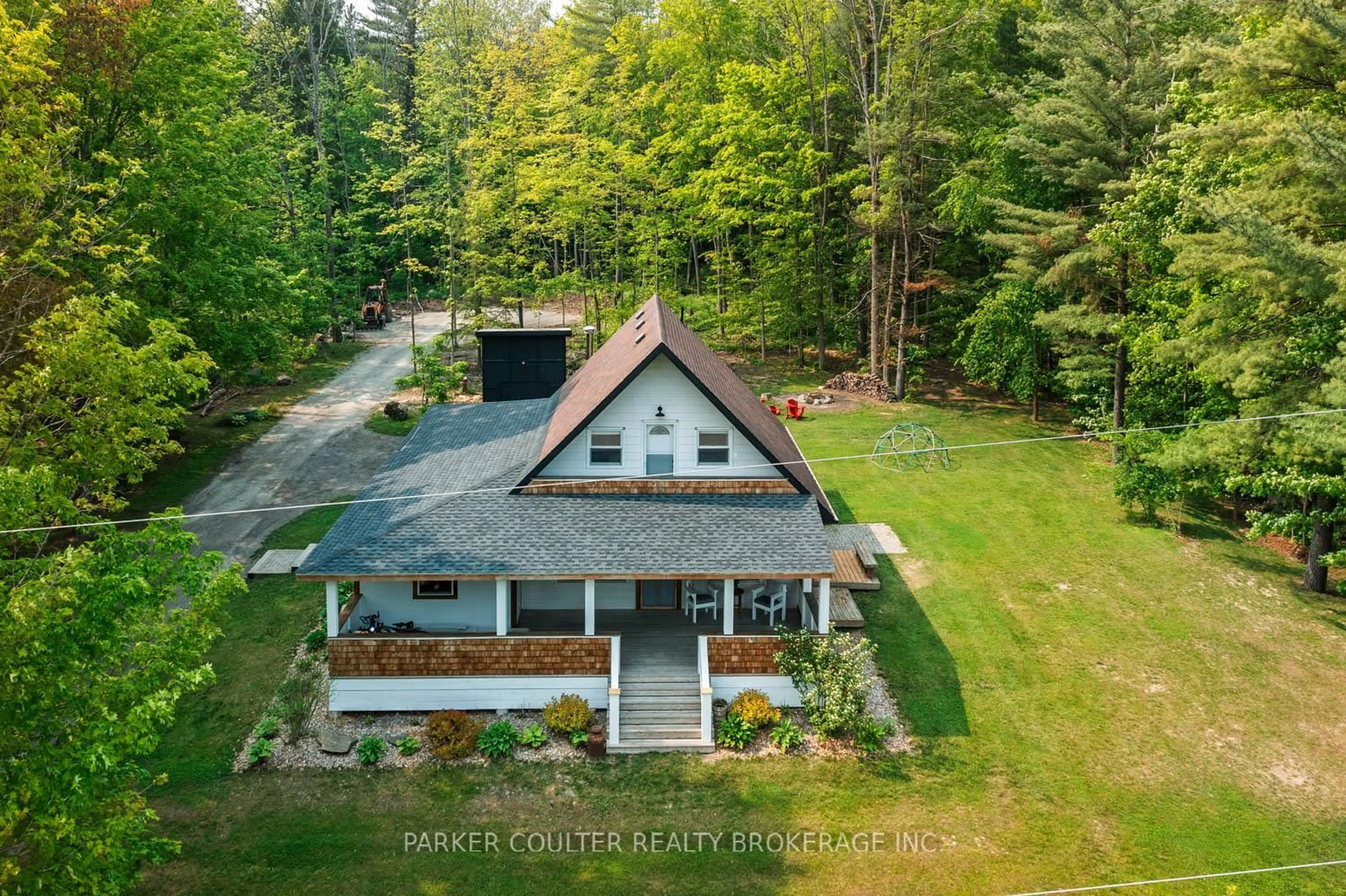 A pic from outside/outdoor area/front of a property/back of a property/a pic from drone, water/lake/river/ocean view for 2352 Mcdonald Rd, Springwater Ontario L0L 1P0