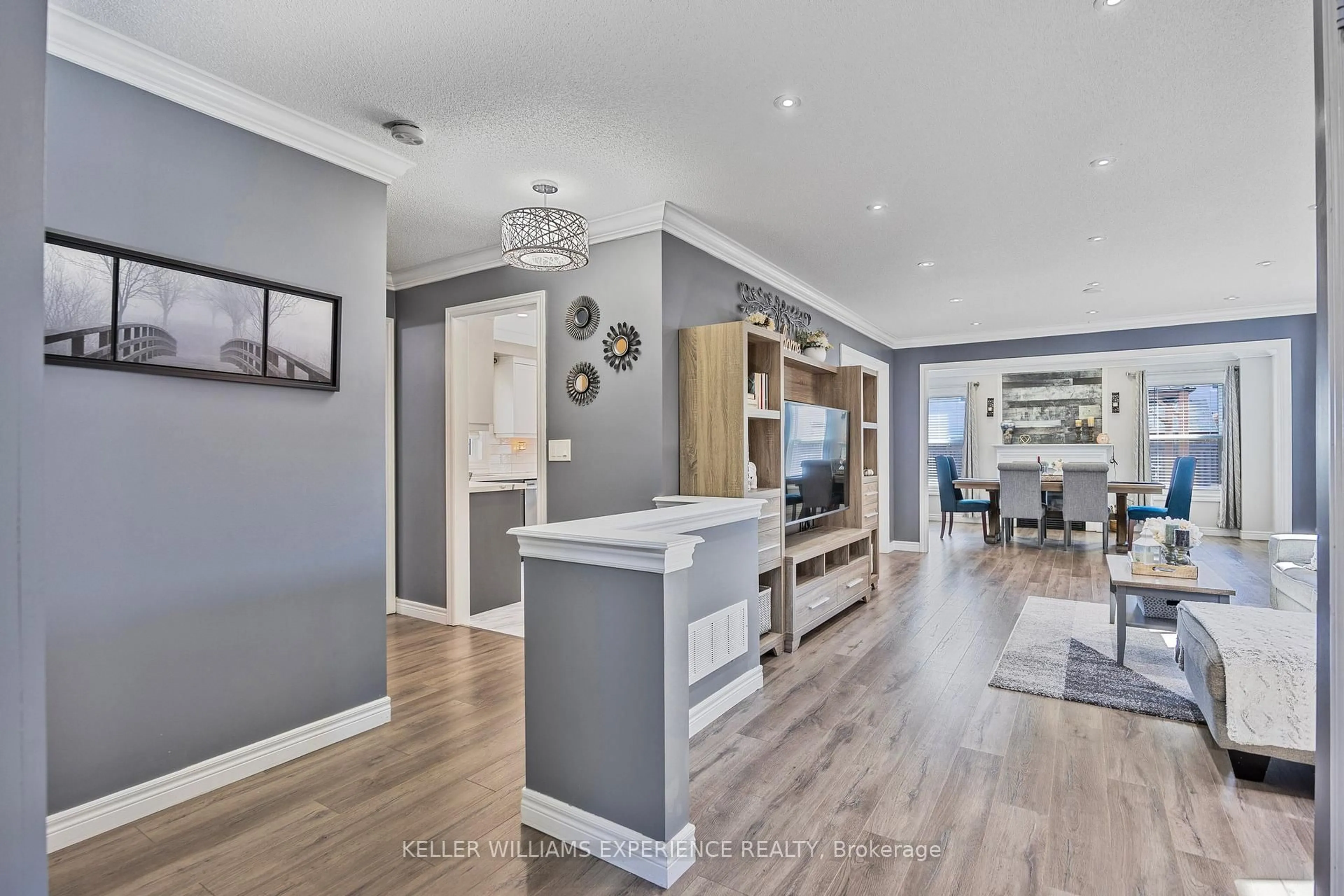 Open concept kitchen, wood/laminate floor for 72 Lake Cres, Barrie Ontario L4N 6A6