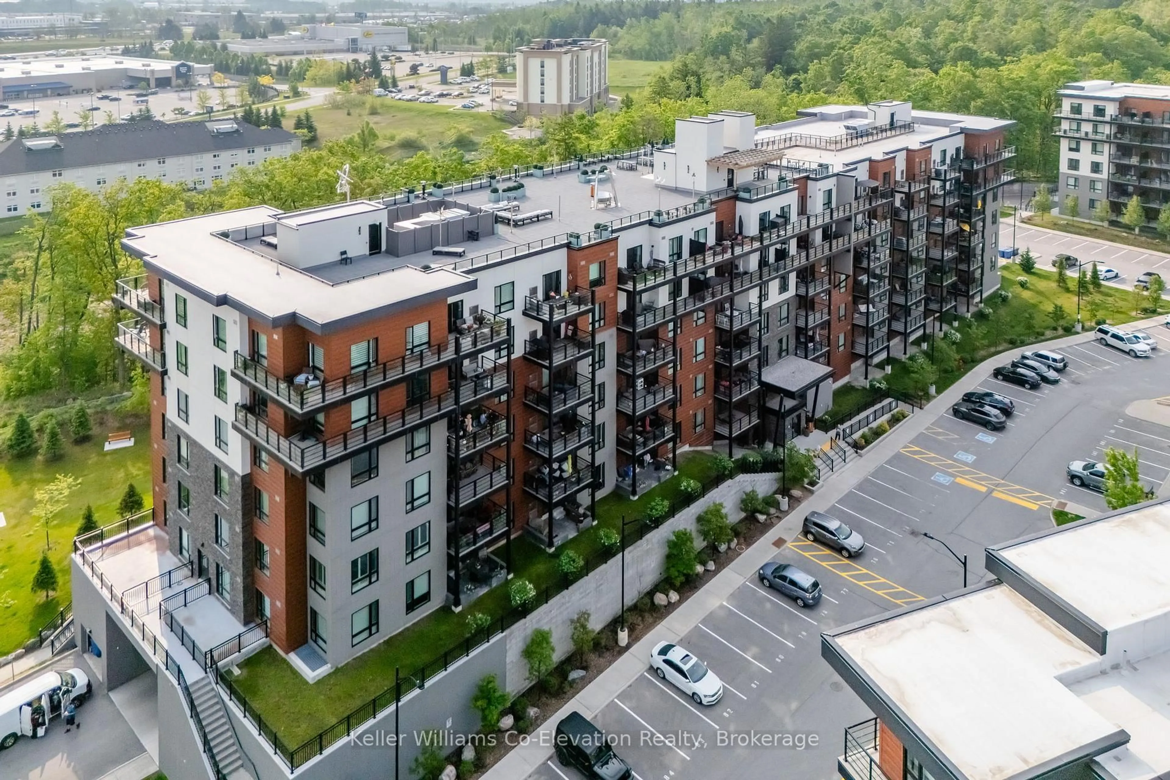 A pic from outside/outdoor area/front of a property/back of a property/a pic from drone, city buildings view from balcony for 302 Essa Rd #114, Barrie Ontario L9J 0H3