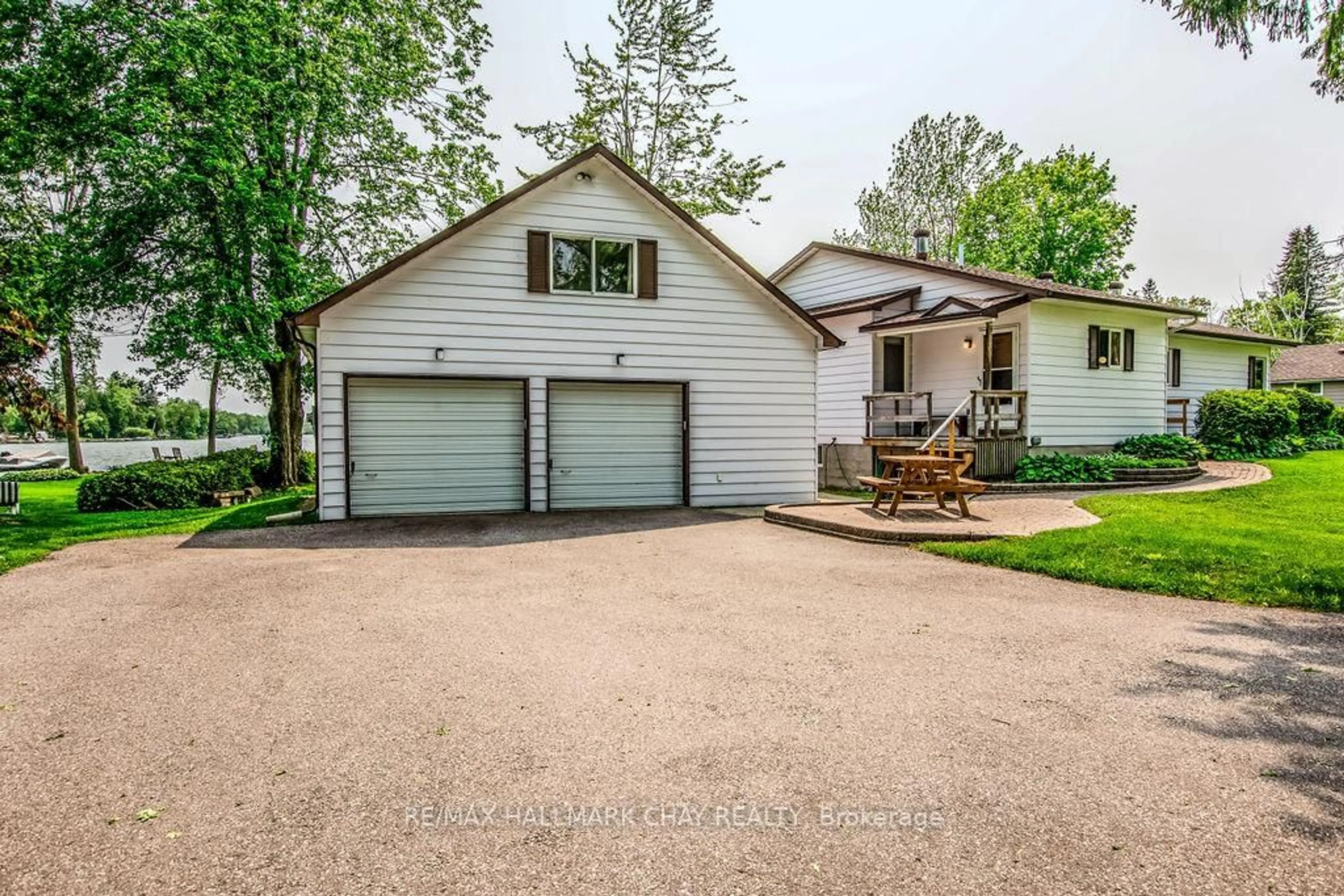 A pic from outside/outdoor area/front of a property/back of a property/a pic from drone, street for 5566 Gray's Bay Rd, Ramara Ontario L0K 1L0
