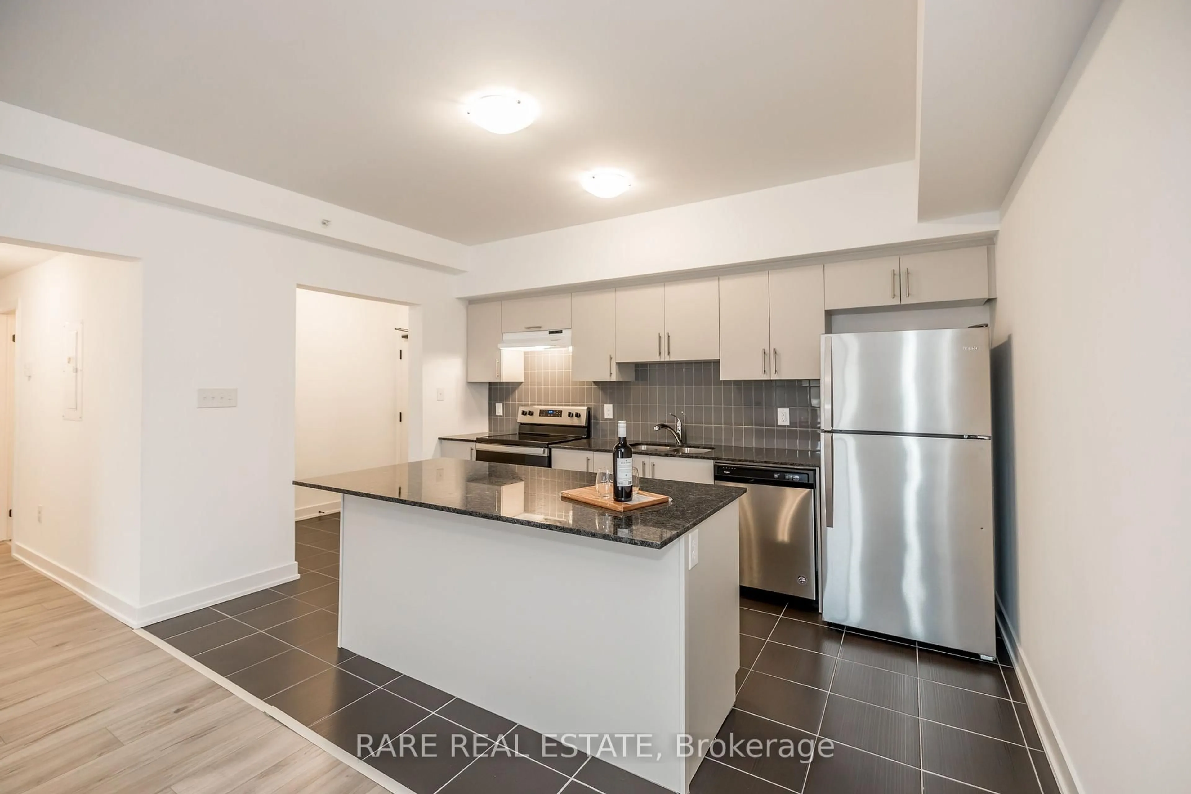 Open concept kitchen, unknown for 6 Spice Way #106, Barrie Ontario L9J 0J9