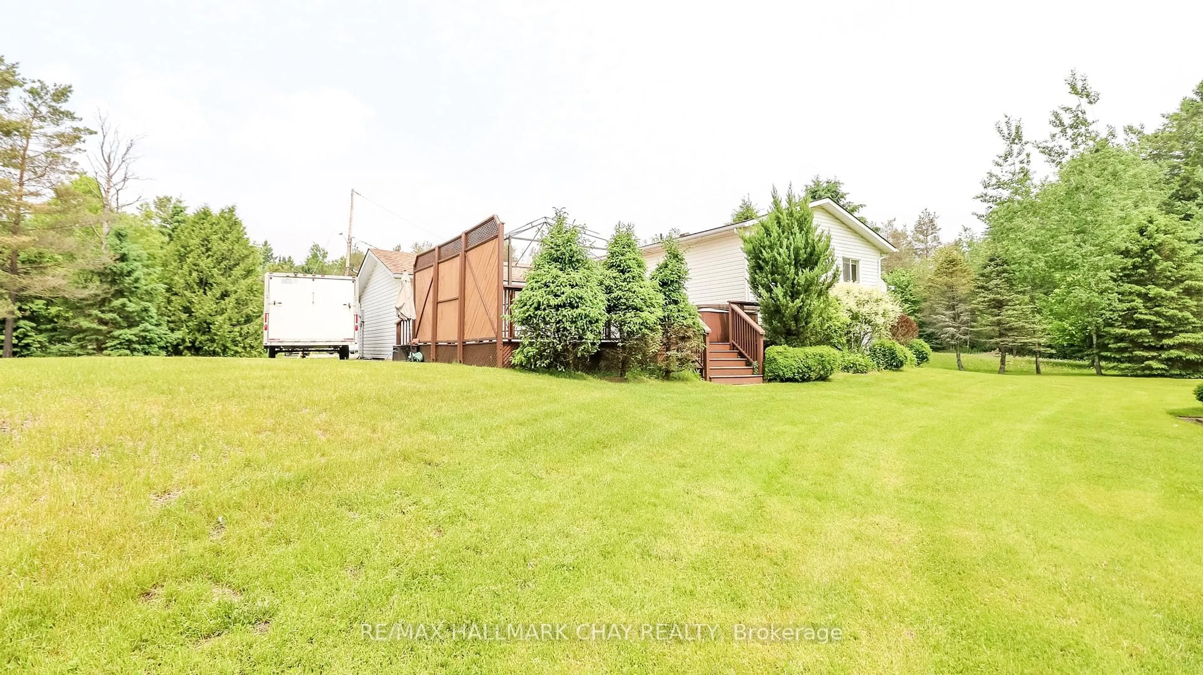 A pic from outside/outdoor area/front of a property/back of a property/a pic from drone, unknown for 19 Crystalwood Lane, Springwater Ontario L0L 1X0
