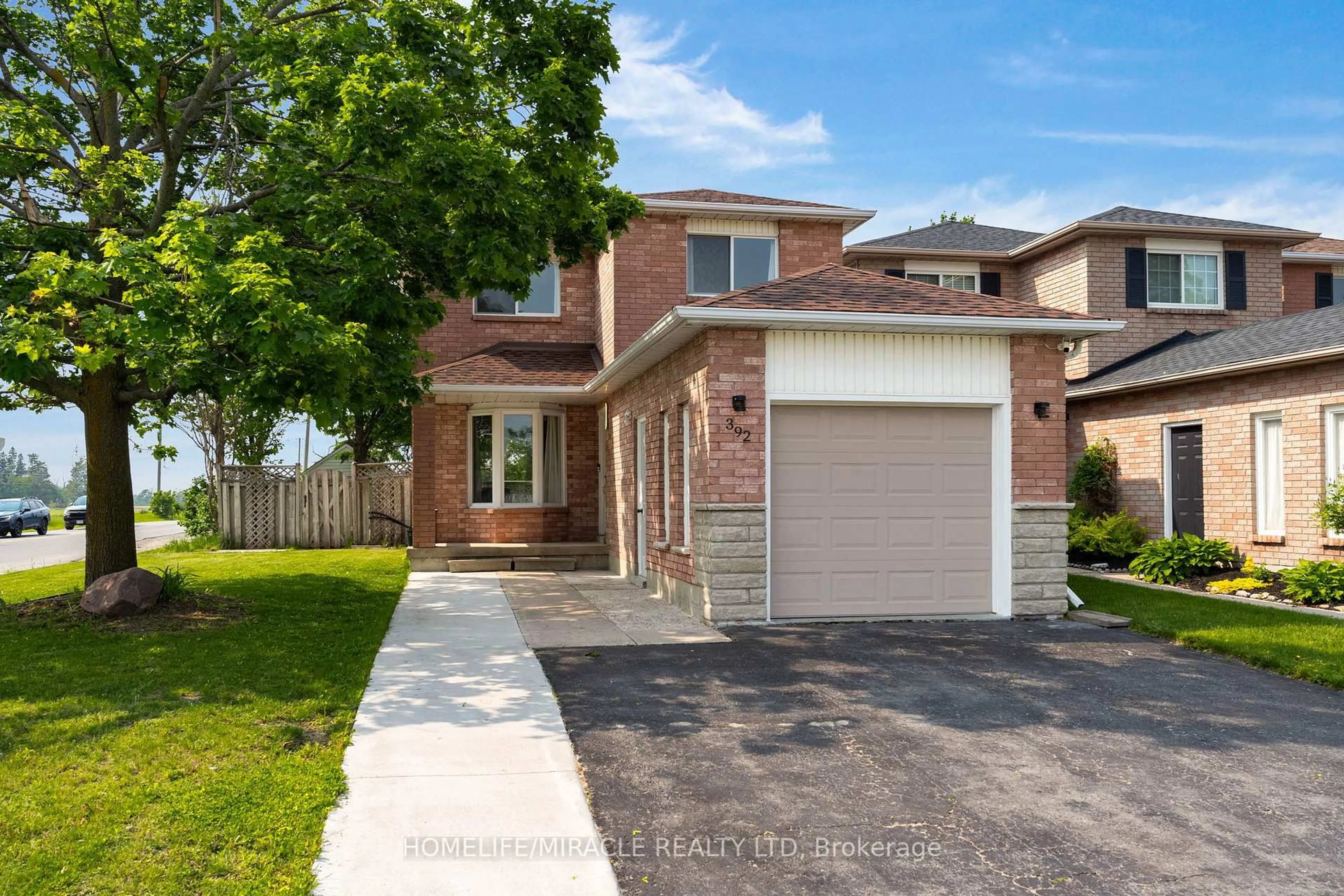 Home with brick exterior material, street for 392 Livingstone St, Barrie Ontario L4N 7M9