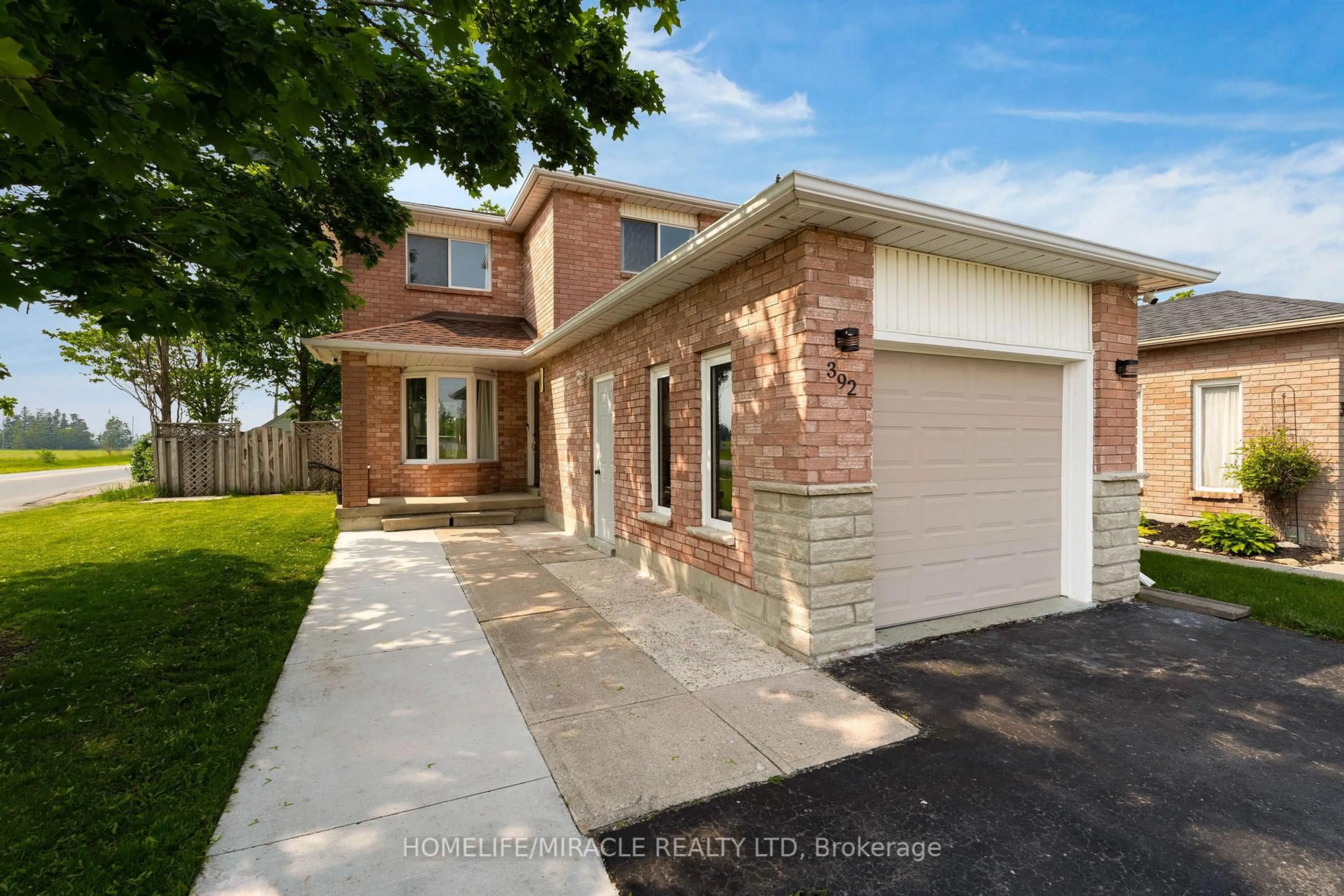 Home with brick exterior material, street for 392 Livingstone St, Barrie Ontario L4N 7M9