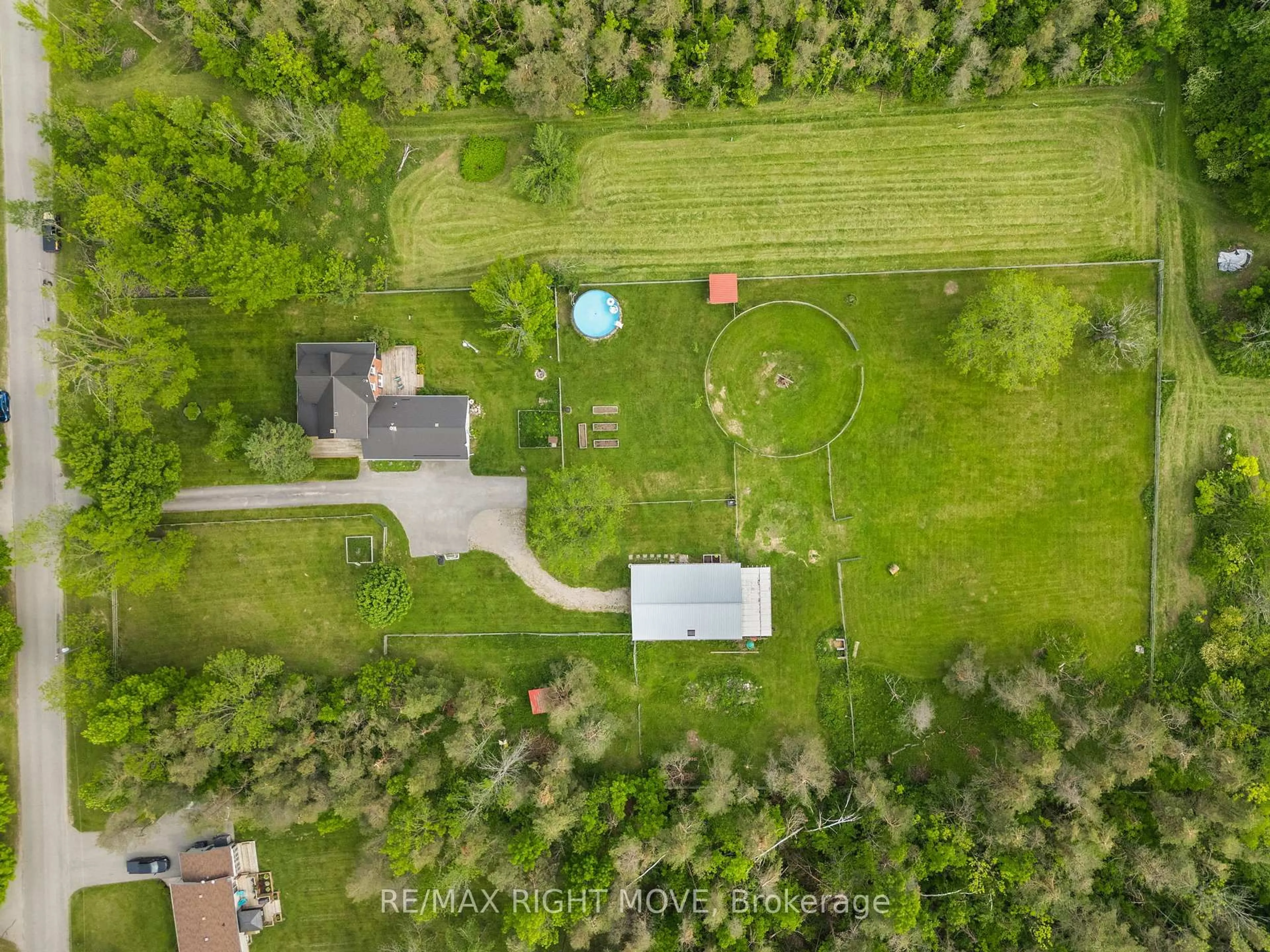 A pic from outside/outdoor area/front of a property/back of a property/a pic from drone, forest/trees view for 3062 Townline Rr5 Townline, Oro-Medonte Ontario L0K 1E0