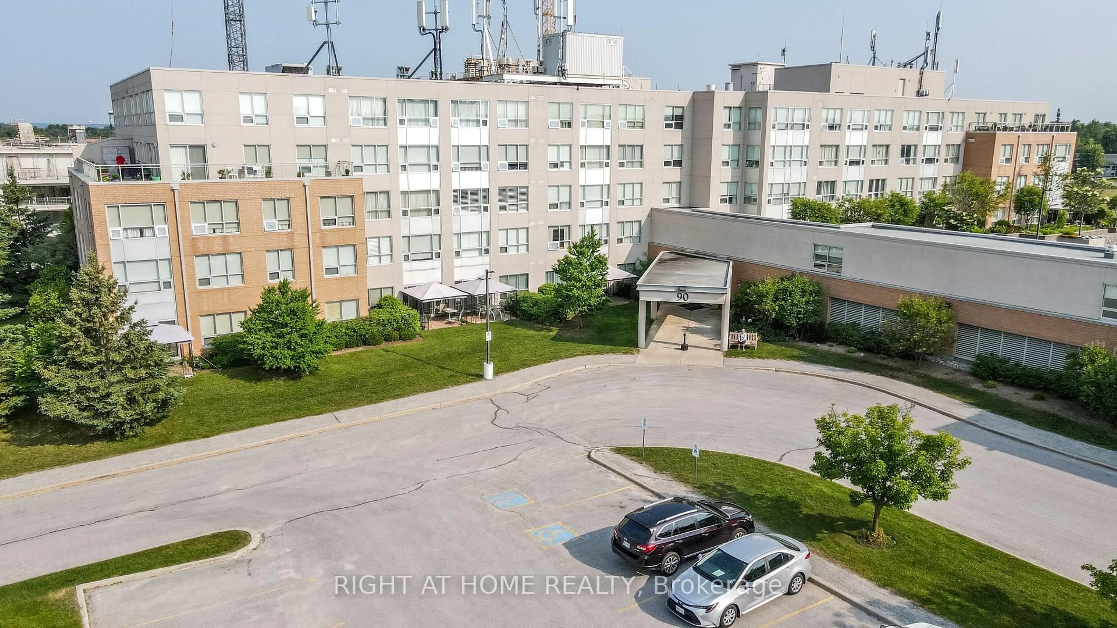 A pic from outside/outdoor area/front of a property/back of a property/a pic from drone, city buildings view from balcony for 90 Dean Ave #109, Barrie Ontario L4N 0M3