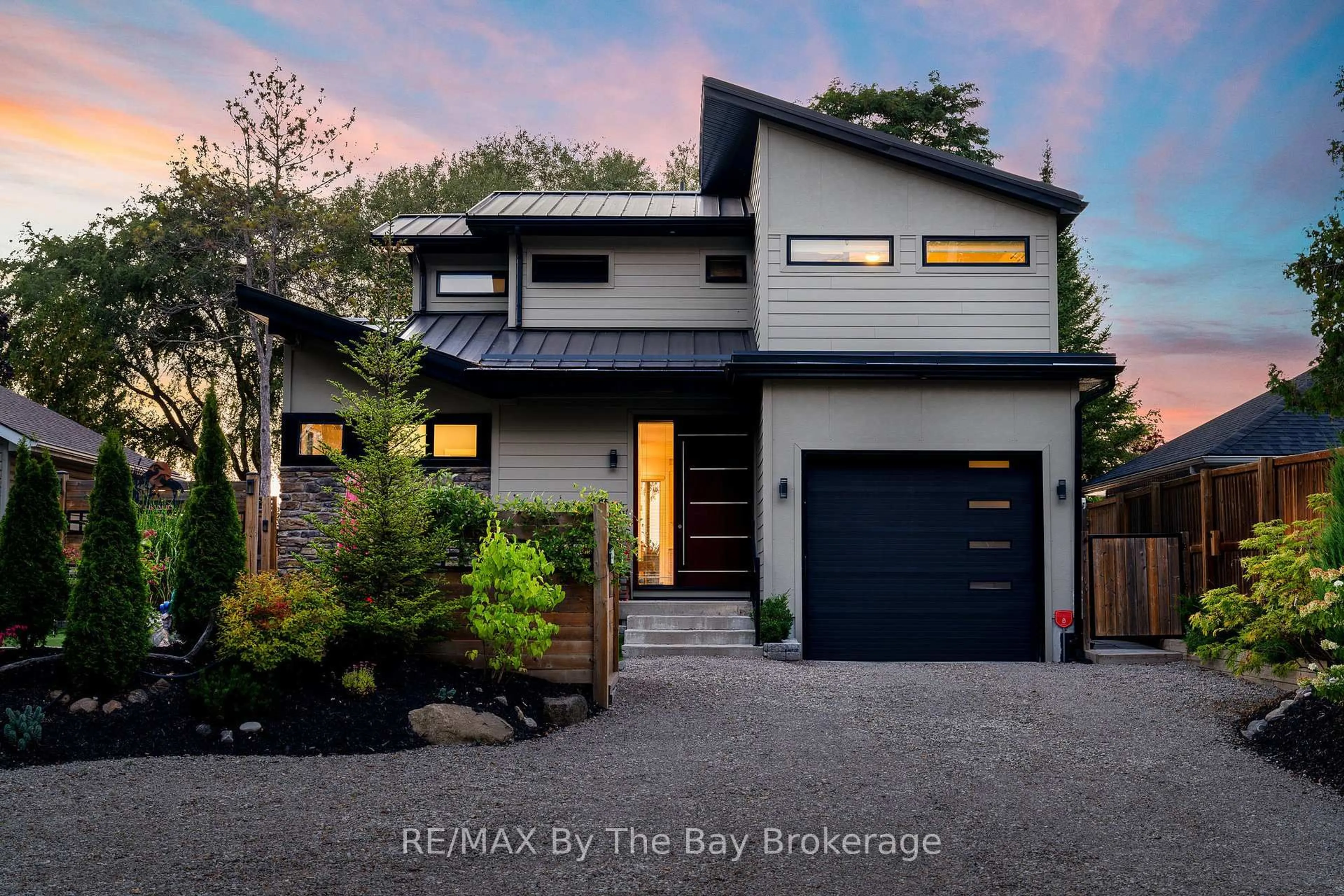 Home with brick exterior material, street for 2206 Tiny Beaches Rd, Tiny Ontario L0L 1P1