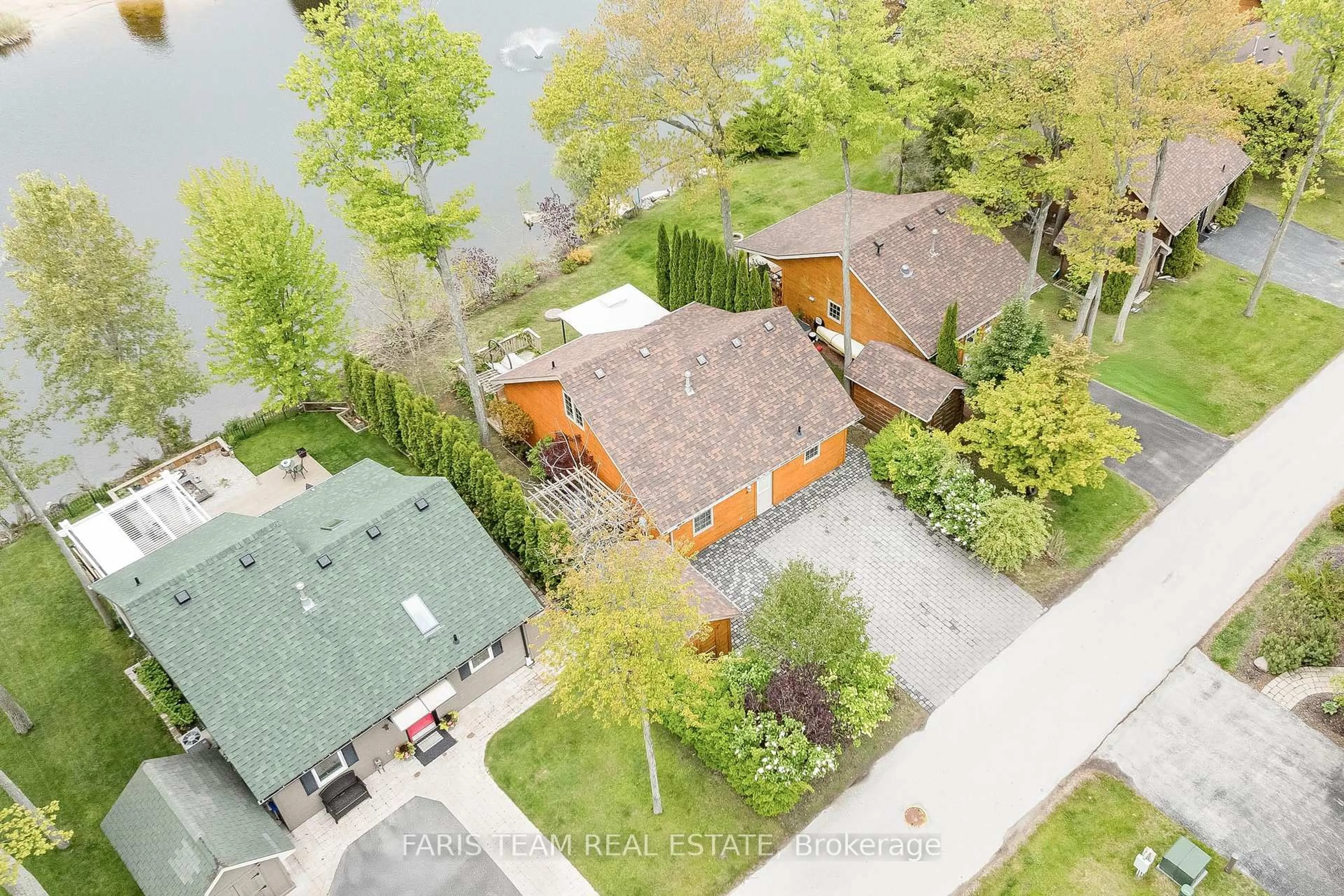 A pic from outside/outdoor area/front of a property/back of a property/a pic from drone, water/lake/river/ocean view for 8 Cabin Cres, Wasaga Beach Ontario L9Z 1X7