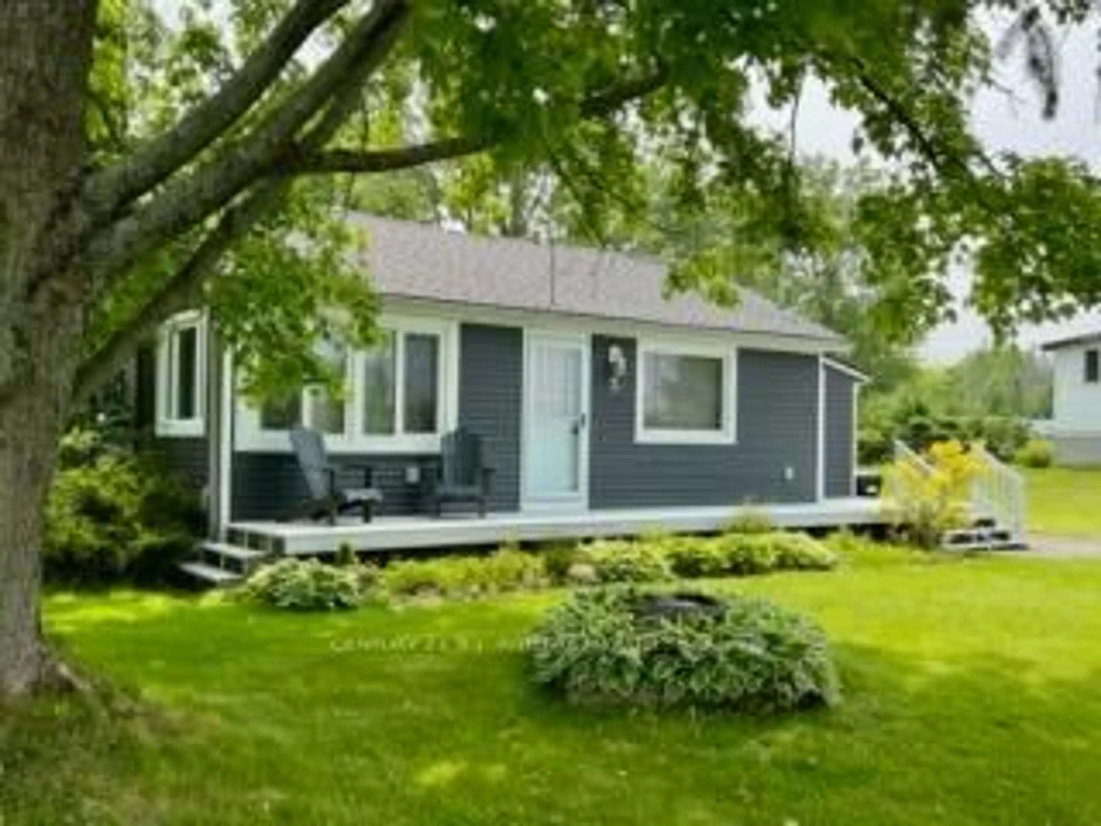 Home with vinyl exterior material, street for 5 Delta Dr, Tay Ontario L0K 2C0