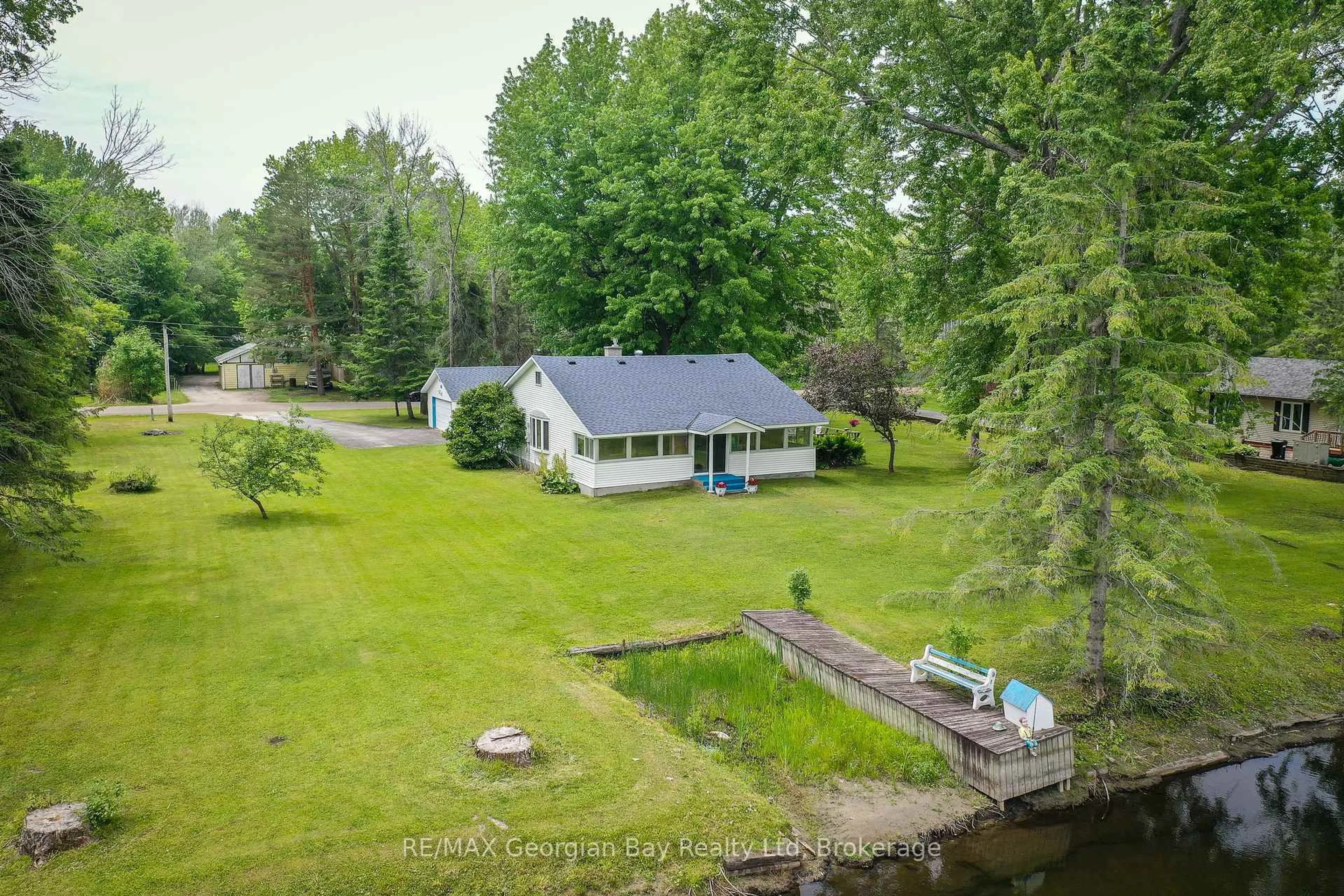 A pic from outside/outdoor area/front of a property/back of a property/a pic from drone, water/lake/river/ocean view for 31 Hearthstone Dr, Tay Ontario L0K 2C0