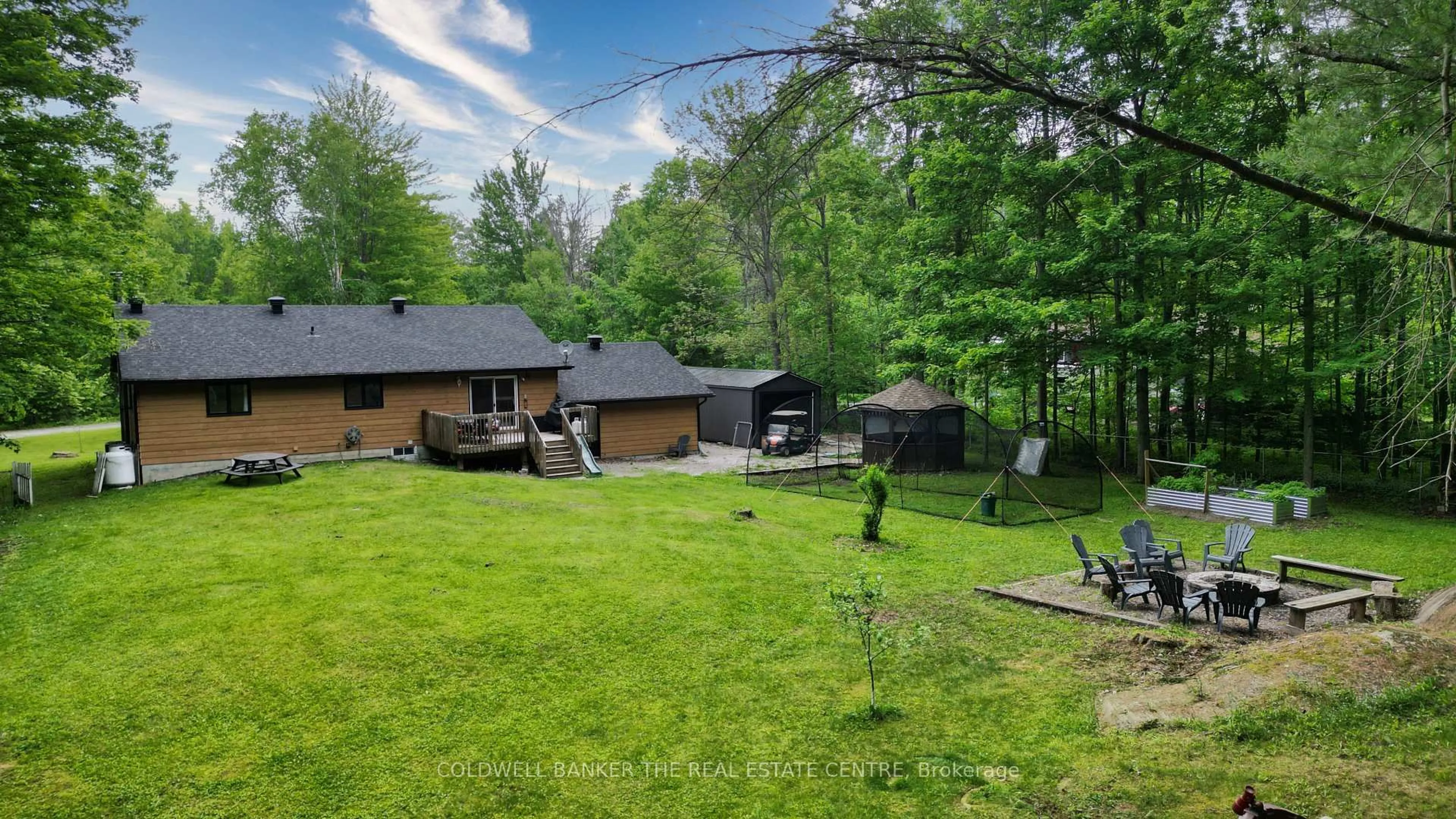 A pic from outside/outdoor area/front of a property/back of a property/a pic from drone, forest/trees view for 4557 Trent Tr, Severn Ontario L0K 2B0