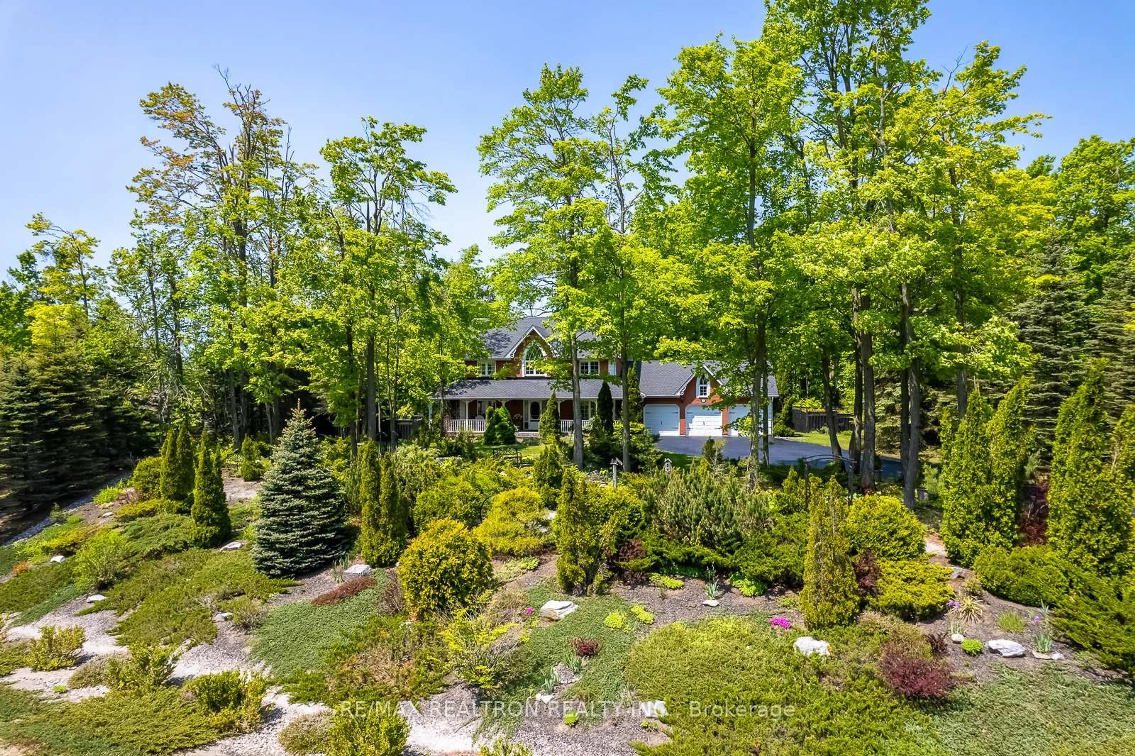 A pic from outside/outdoor area/front of a property/back of a property/a pic from drone, forest/trees view for 20 Green Mountain Crt, Oro-Medonte Ontario L0L 2L0