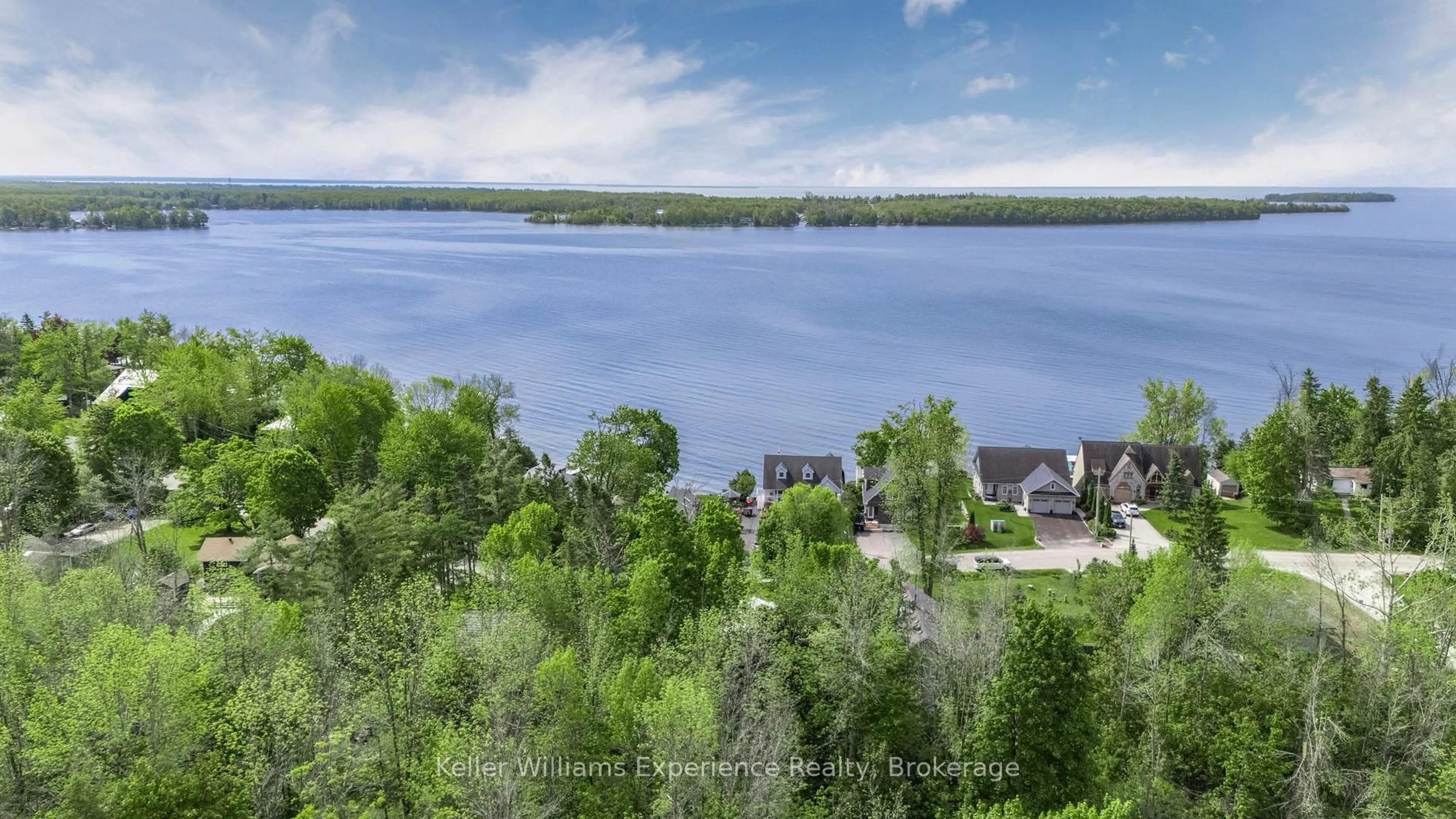 A pic from outside/outdoor area/front of a property/back of a property/a pic from drone, water/lake/river/ocean view for 4308 Orkney Beach Rd, Ramara Ontario L3V 6H7