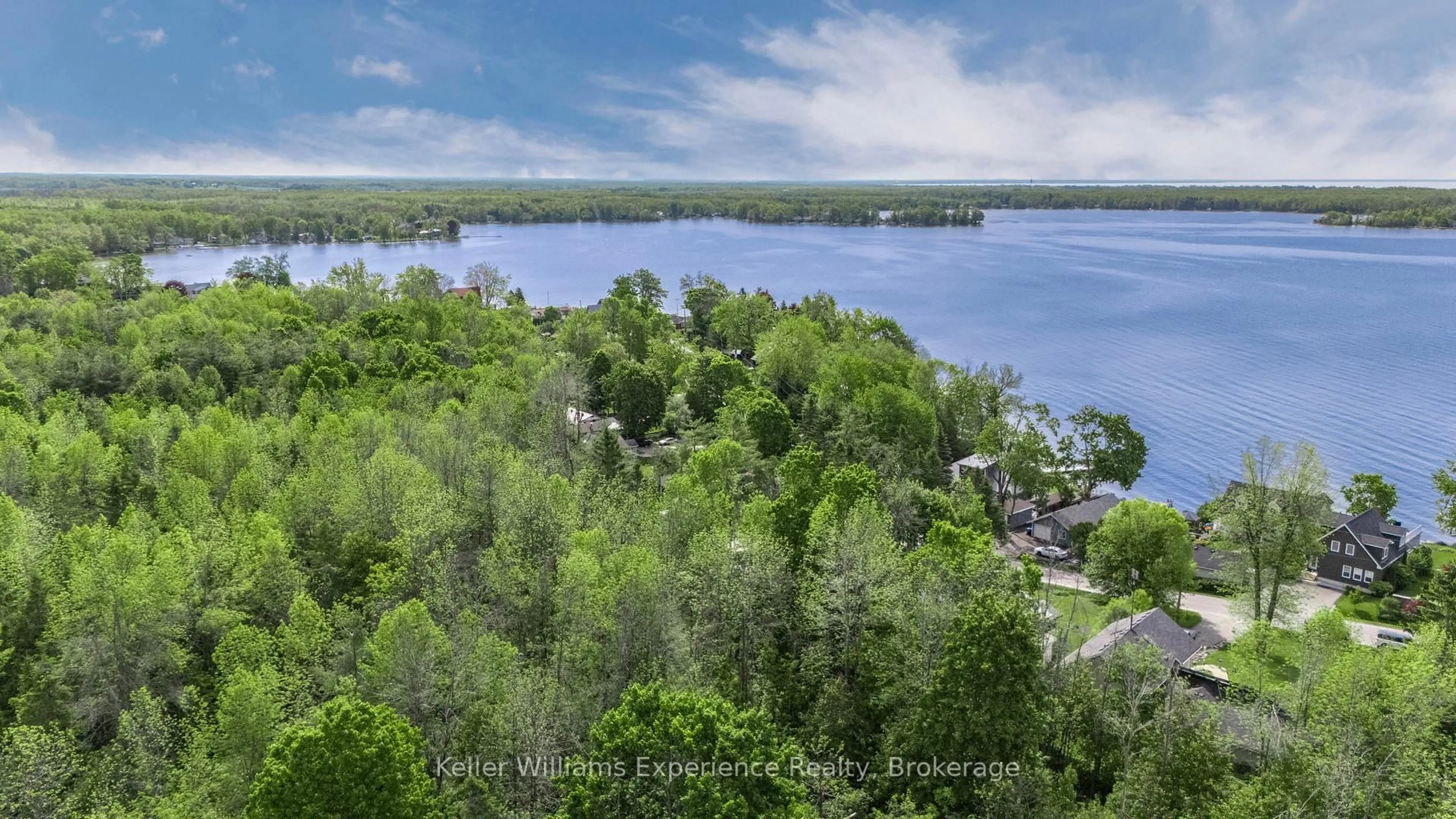 A pic from outside/outdoor area/front of a property/back of a property/a pic from drone, water/lake/river/ocean view for 4308 Orkney Beach Rd, Ramara Ontario L3V 6H7