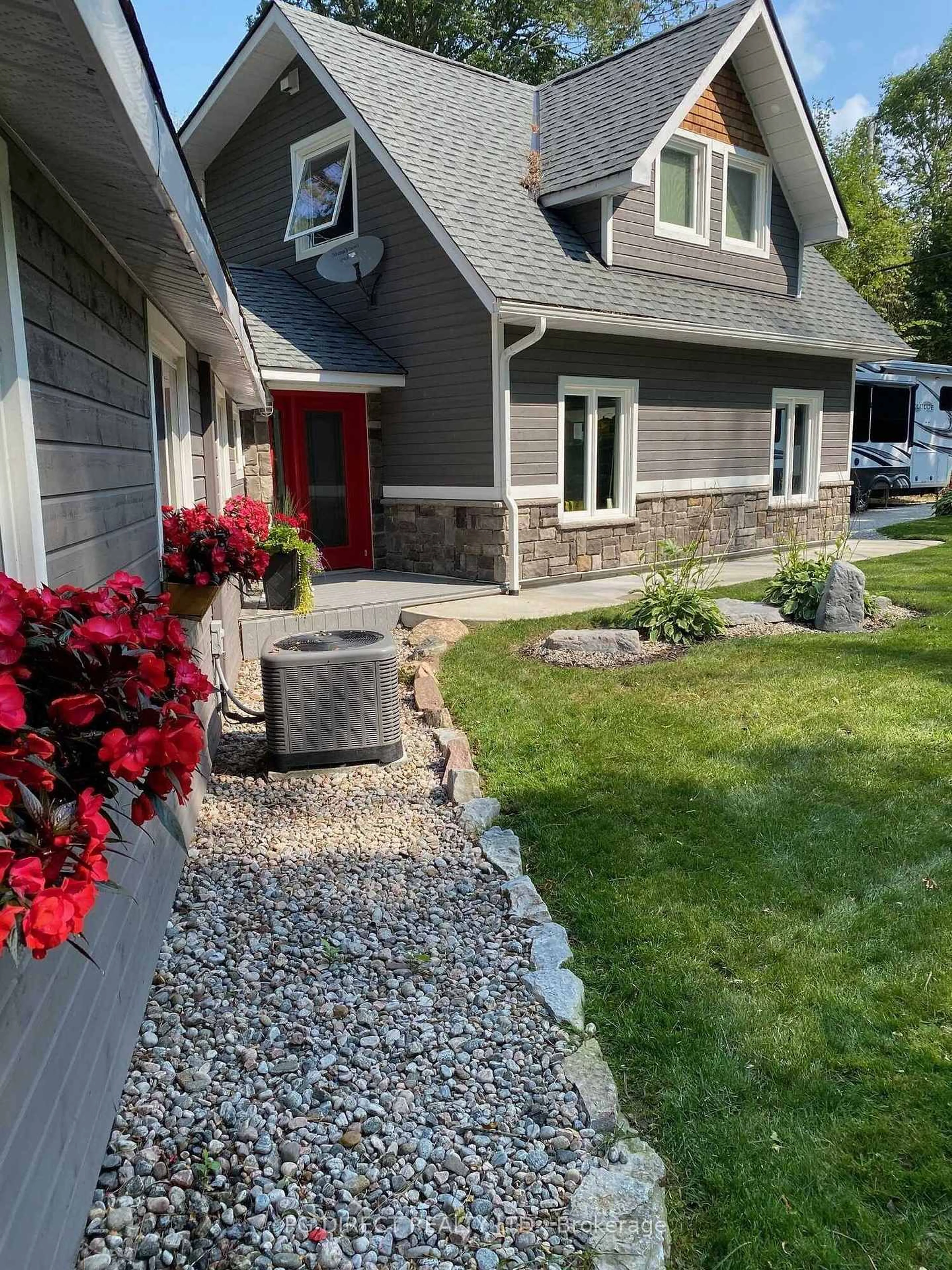 Home with vinyl exterior material, street for 7092 Beach Dr, Ramara Ontario L0K 2B0