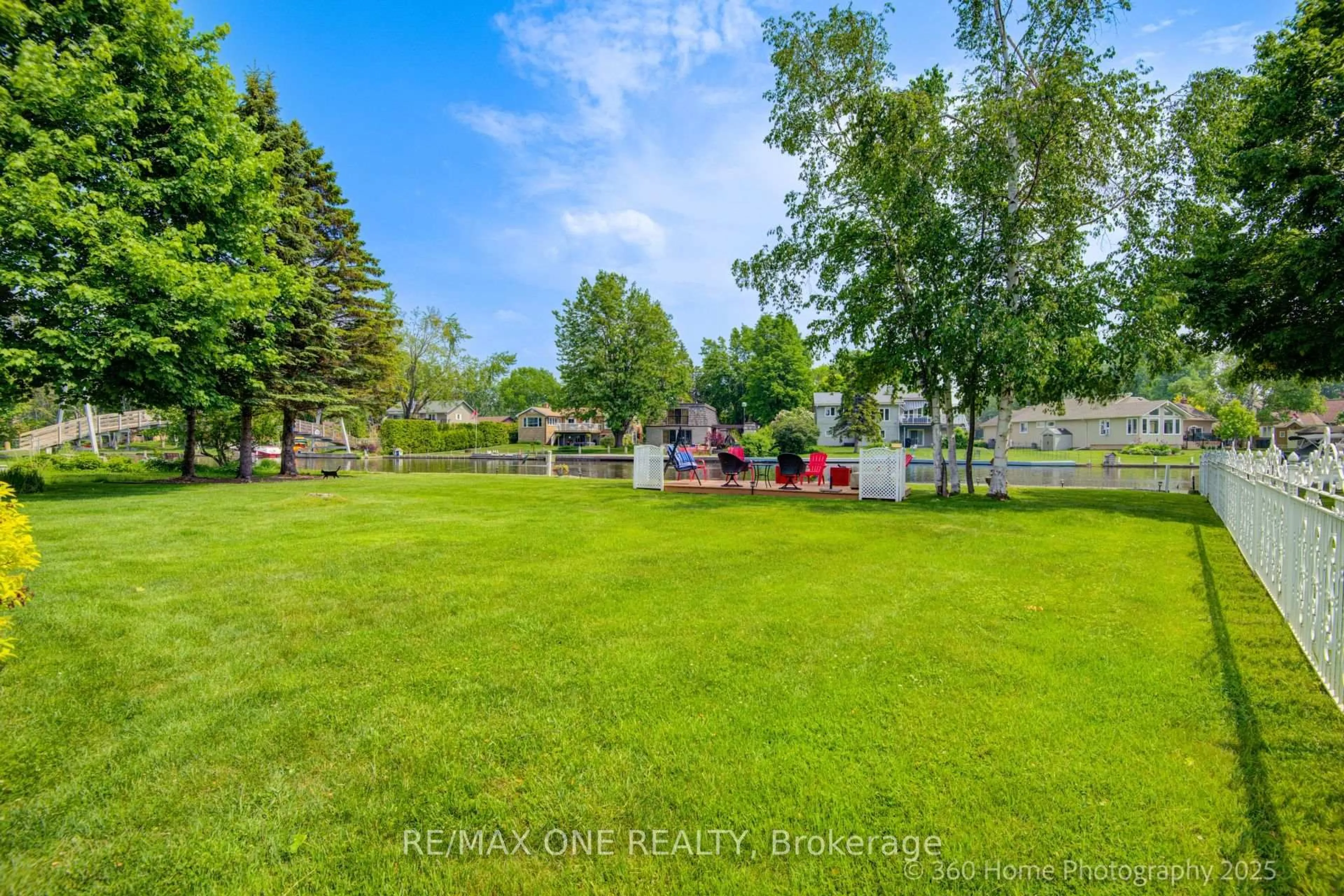 A pic from outside/outdoor area/front of a property/back of a property/a pic from drone, water/lake/river/ocean view for 50 Turtle Path, Ramara Ontario L0K 1B0