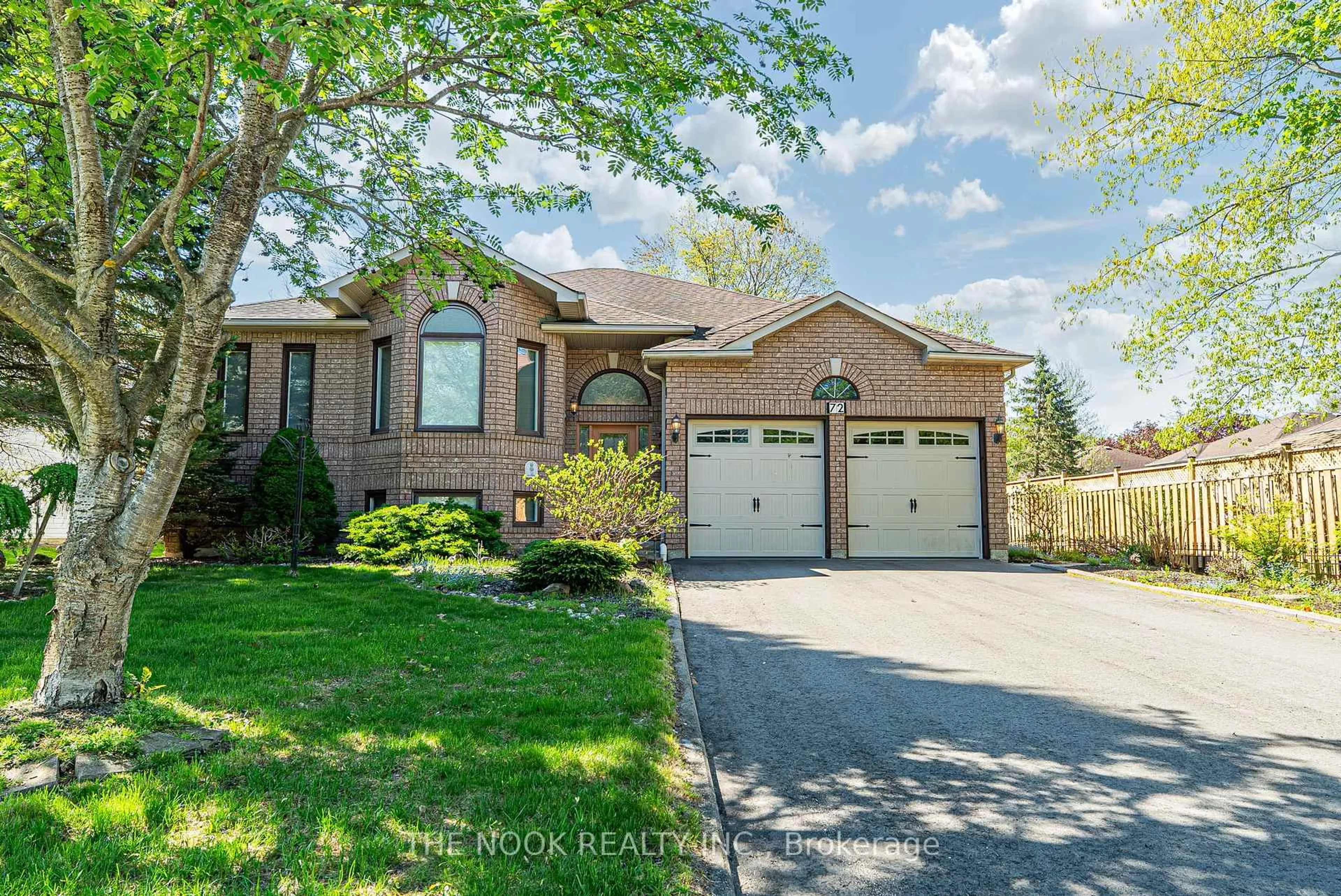 Home with brick exterior material, street for 72 Silver Birch Ave, Wasaga Beach Ontario L9Z 1M2