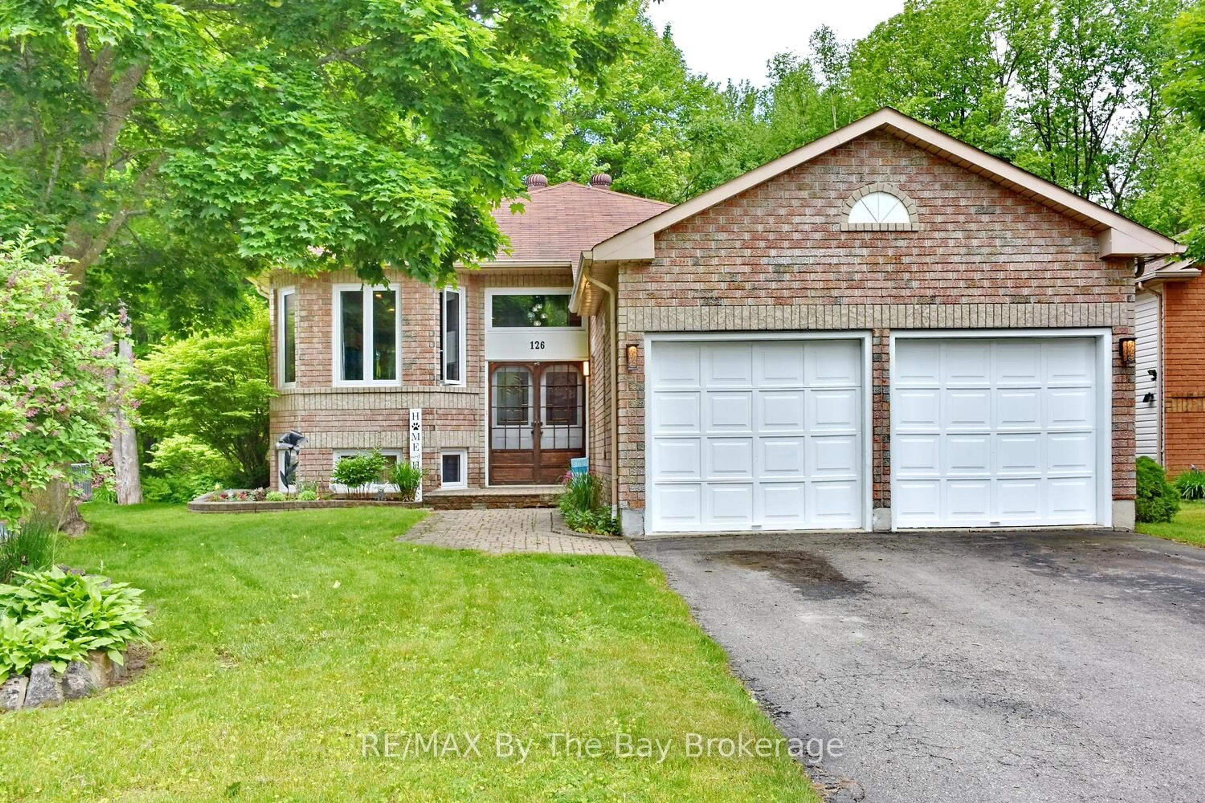 Home with brick exterior material, street for 126 Fernbrook Dr, Wasaga Beach Ontario L9Z 1G6