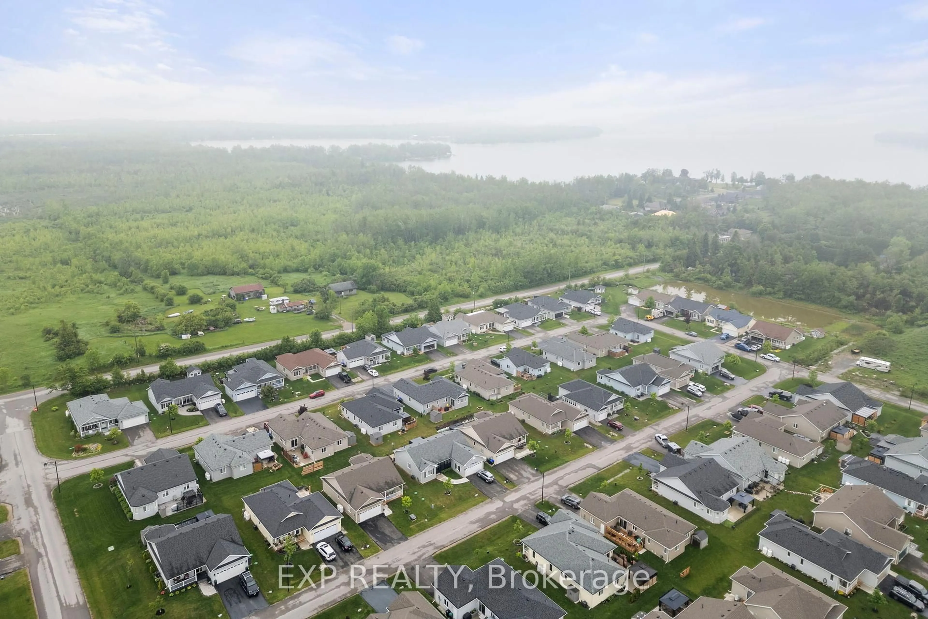 A pic from outside/outdoor area/front of a property/back of a property/a pic from drone, water/lake/river/ocean view for 10 Sinclair Cres, Ramara Ontario L3V 8K1