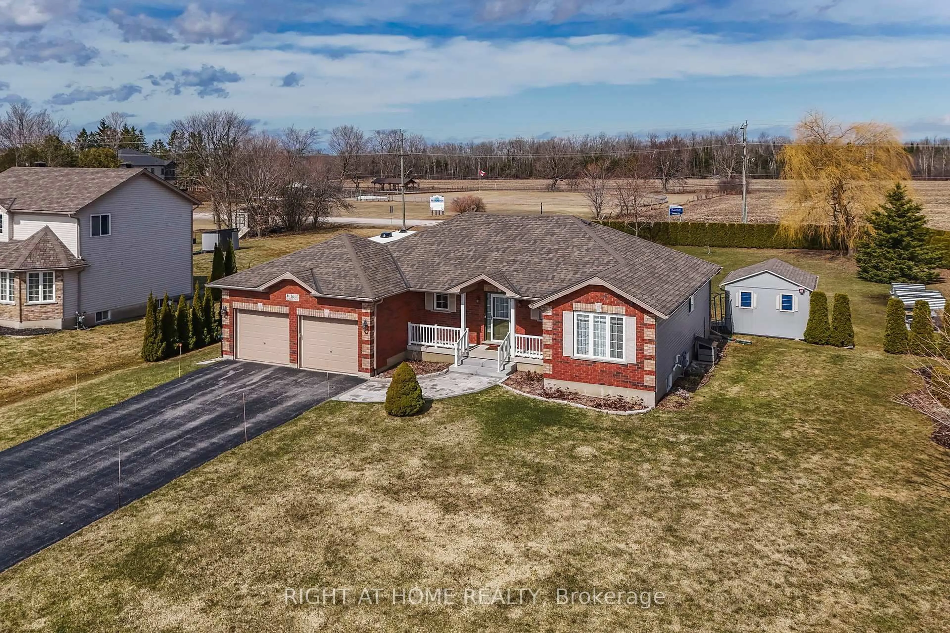 A pic from outside/outdoor area/front of a property/back of a property/a pic from drone, street for 16 O'neill Circ, Springwater Ontario L2L 2K0