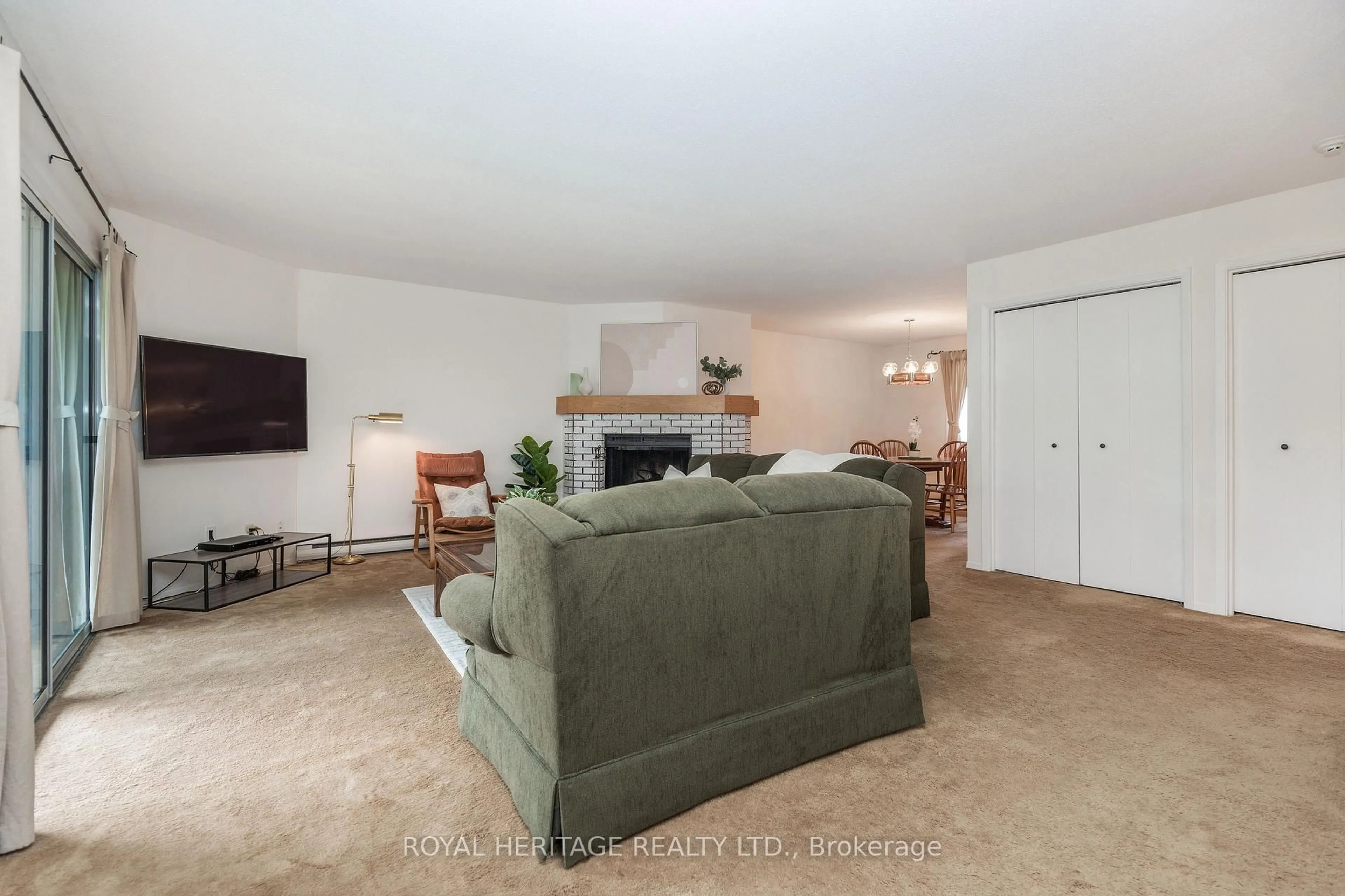 Living room with furniture, carpet floor for 1102 Horseshoe Valley Rd #311, Oro-Medonte Ontario L4M 4Y8