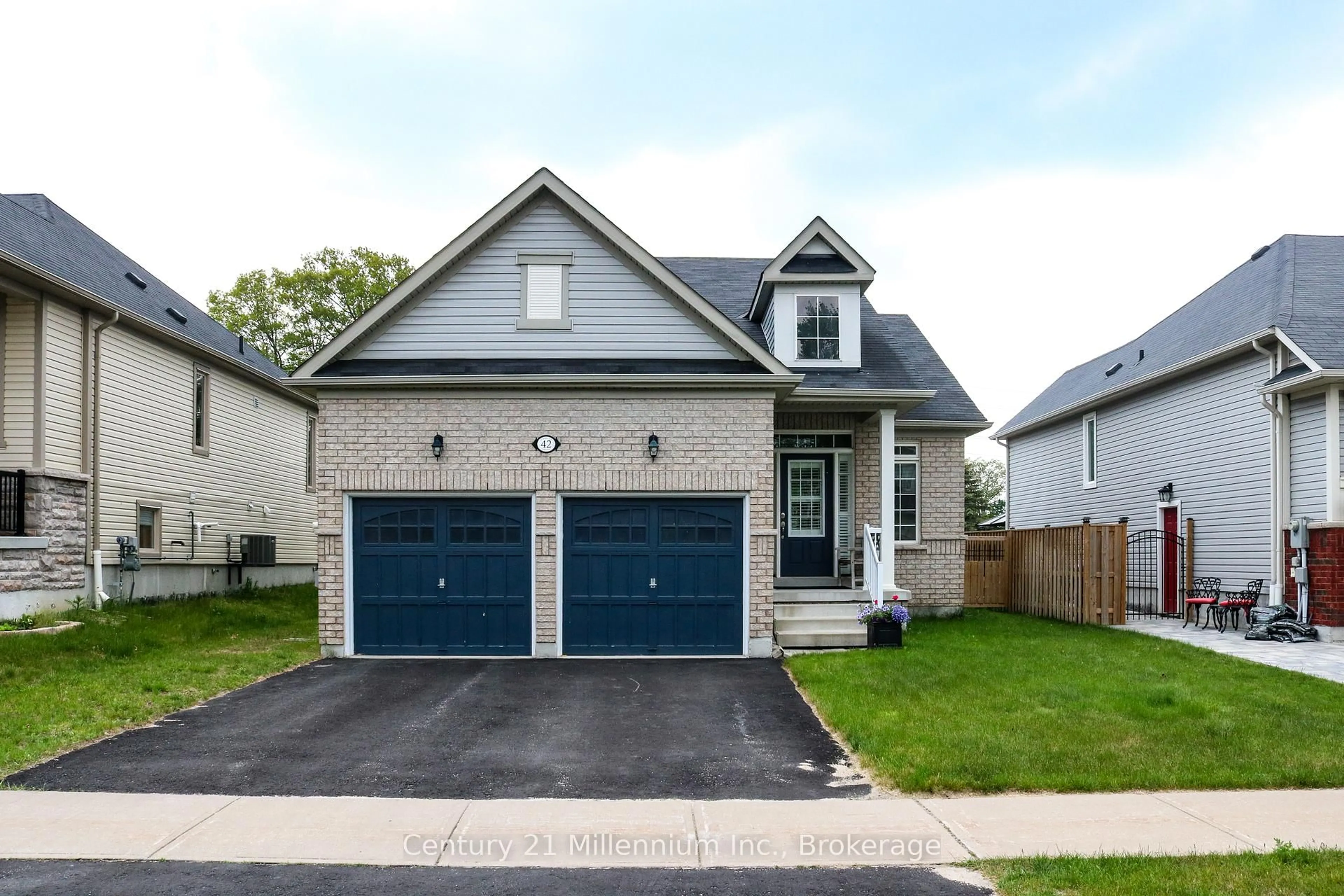 Home with brick exterior material, street for 42 Christy Dr, Wasaga Beach Ontario L9Z 0E5