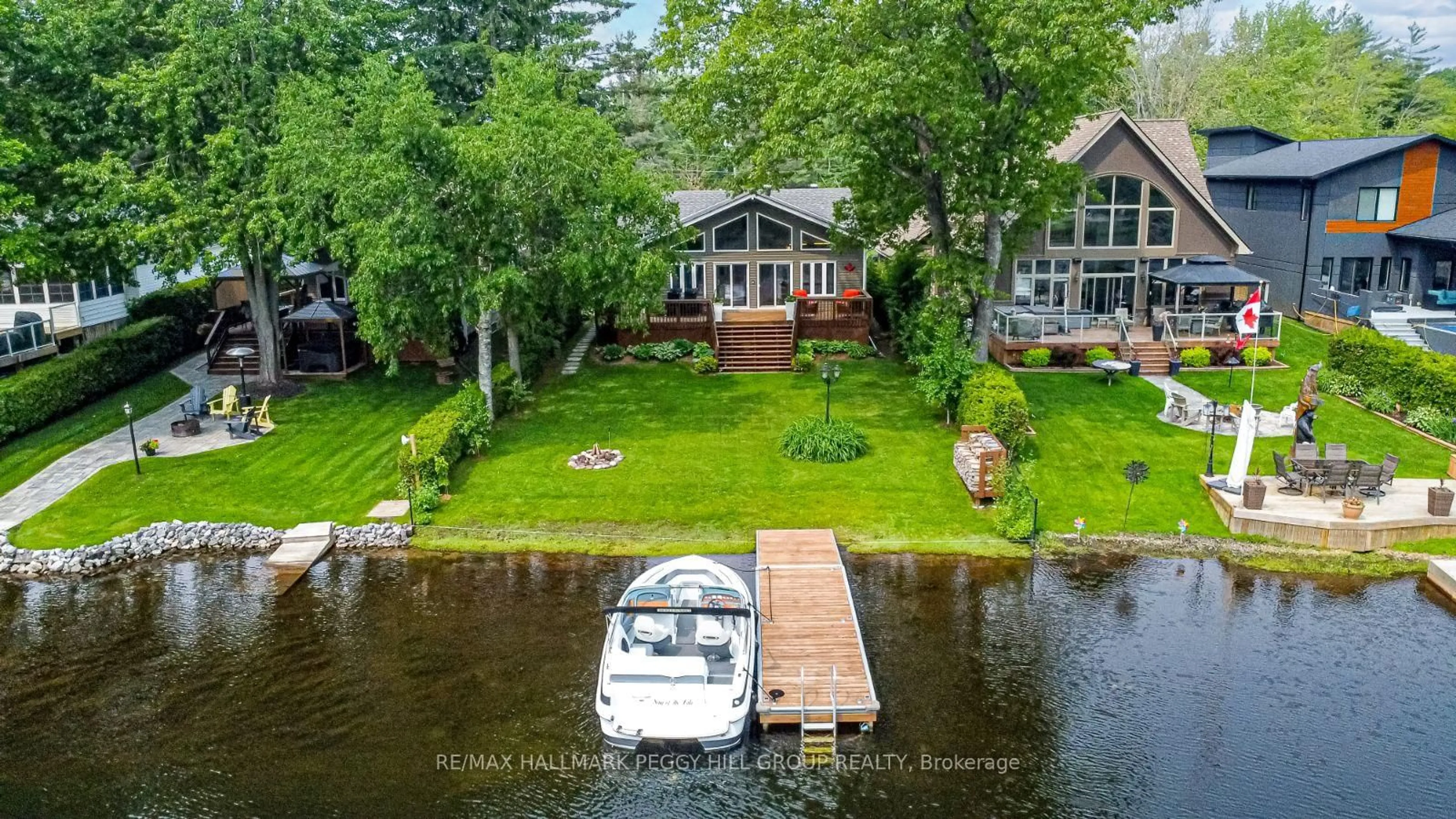 A pic from outside/outdoor area/front of a property/back of a property/a pic from drone, water/lake/river/ocean view for 1663 Peninsula Point Rd, Severn Ontario P0E 1N0