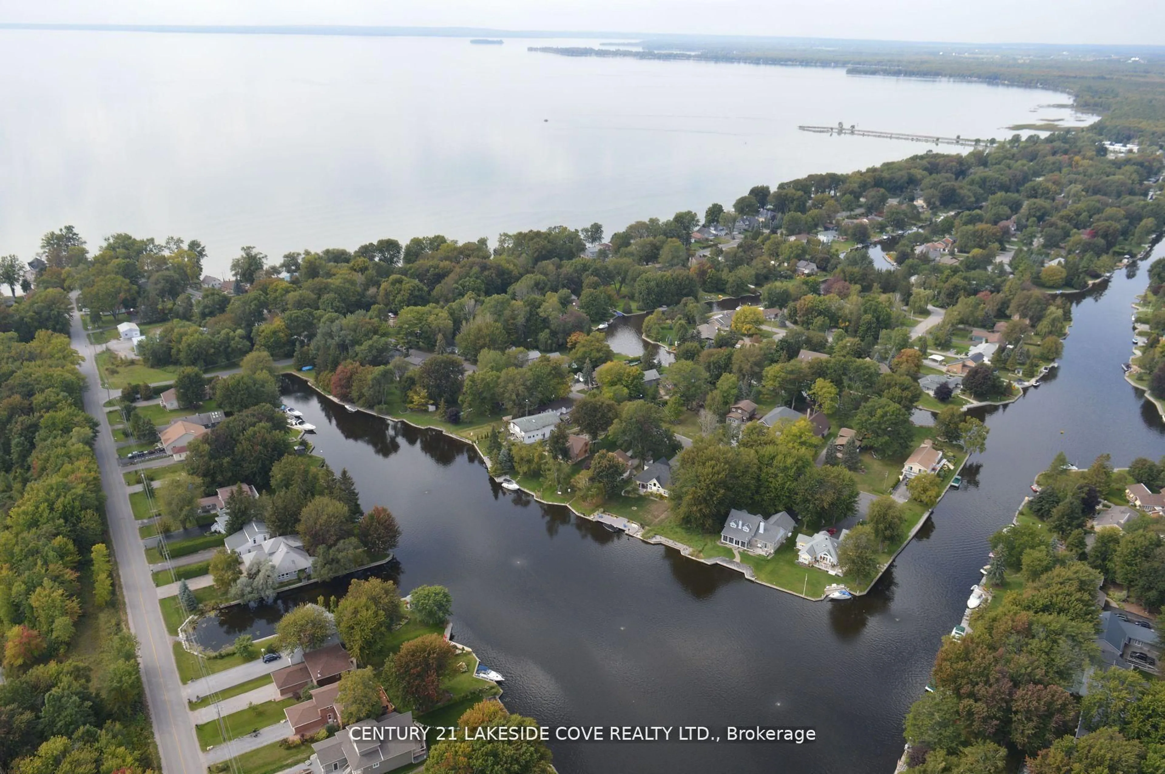 A pic from outside/outdoor area/front of a property/back of a property/a pic from drone, water/lake/river/ocean view for 51 Ridge Ave, Ramara Ontario L0K 1B0
