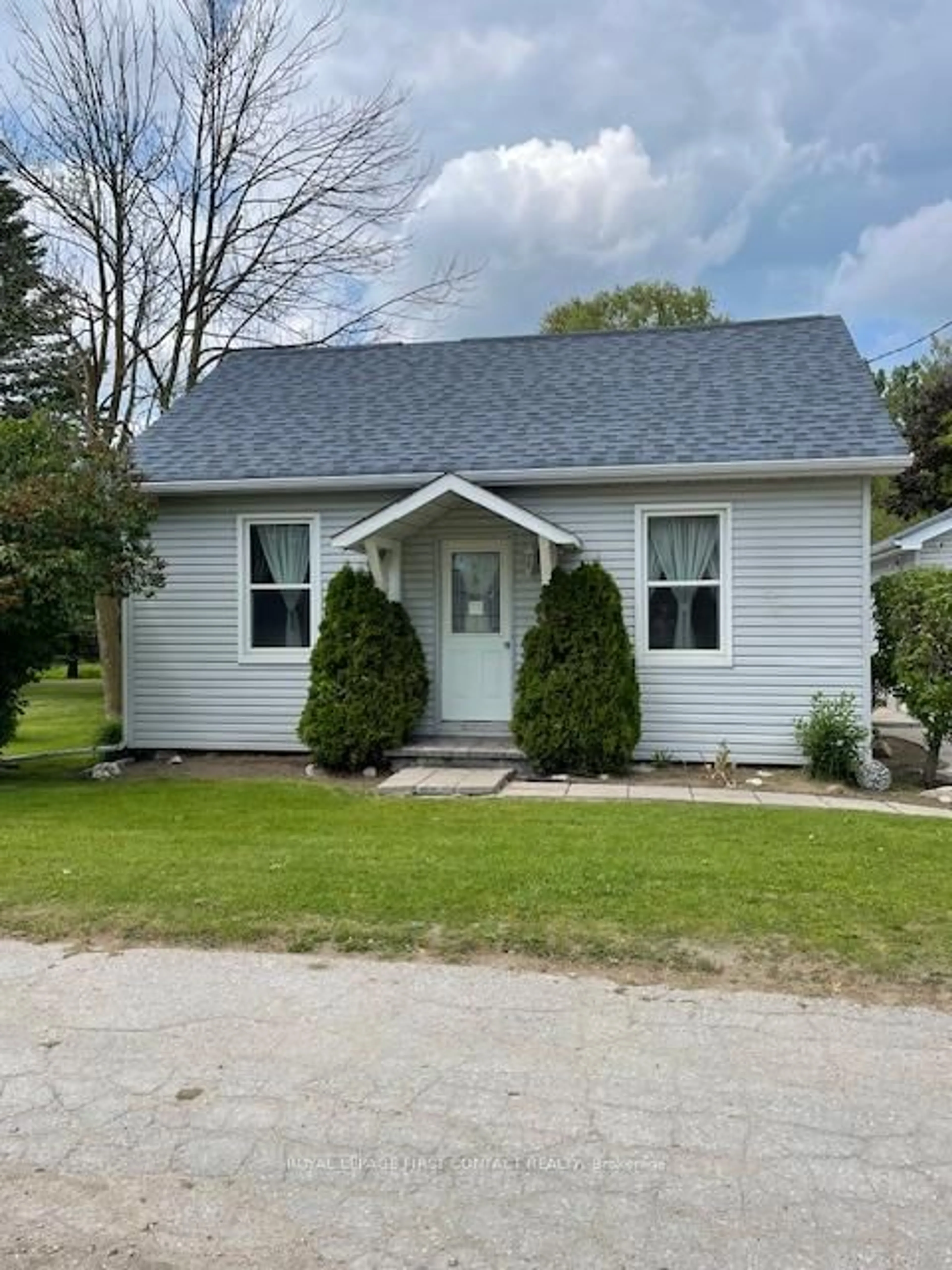 Home with vinyl exterior material, street for 7424 County Rd 91 Rd, Clearview Ontario L0M 1S0