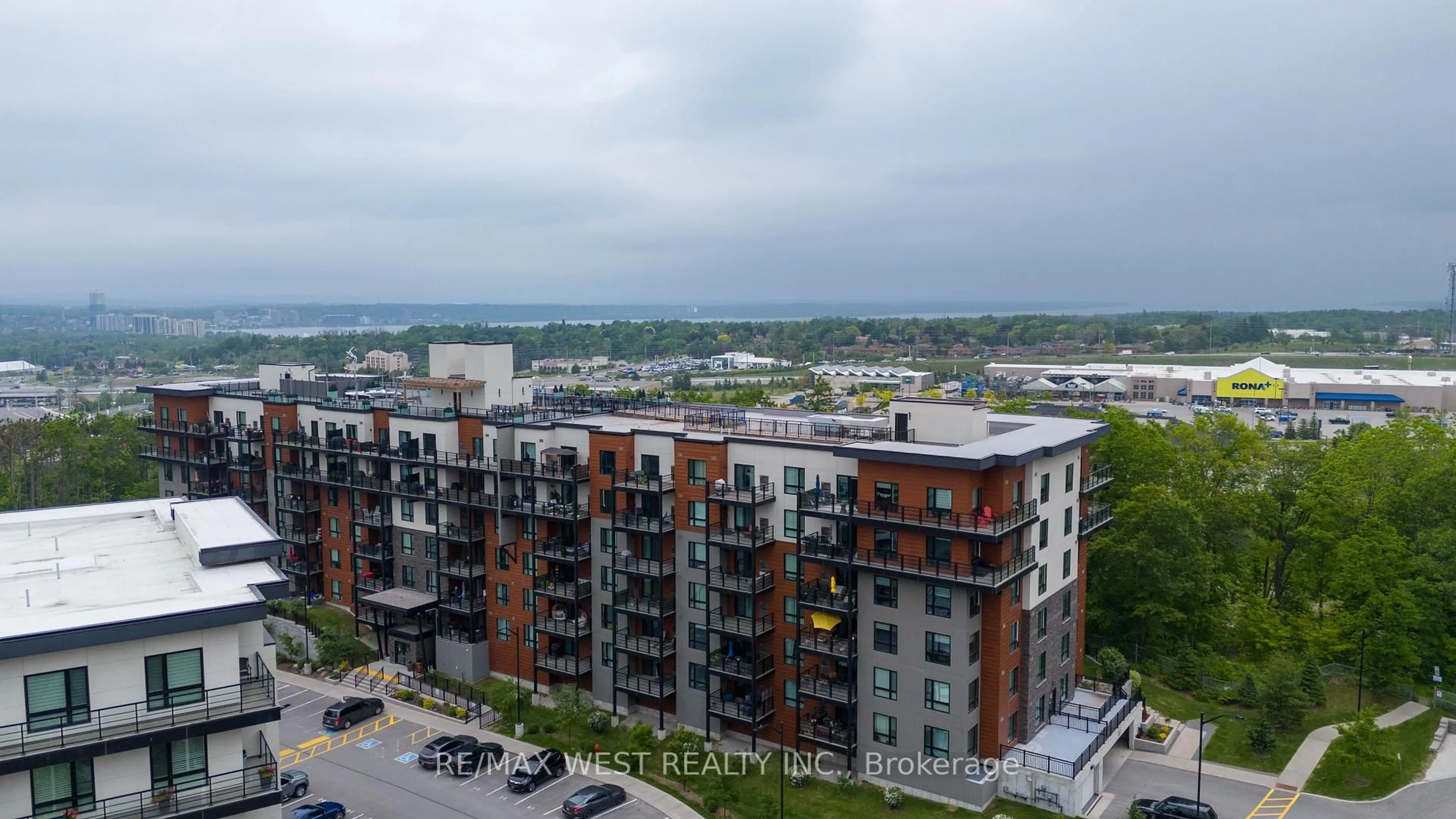 A pic from outside/outdoor area/front of a property/back of a property/a pic from drone, city buildings view from balcony for 302 ESSA Rd #309, Barrie Ontario L9J 0H3