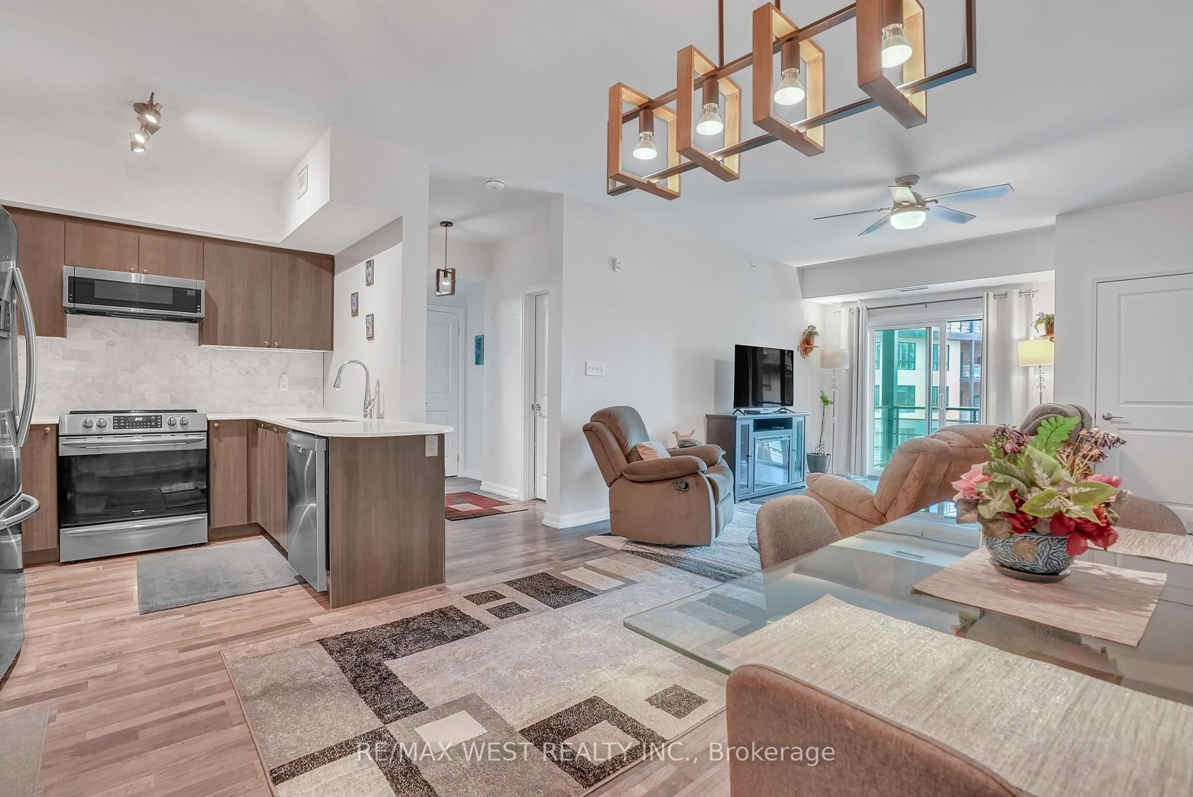 Living room with furniture, ceramic/tile floor for 302 ESSA Rd #309, Barrie Ontario L9J 0H3