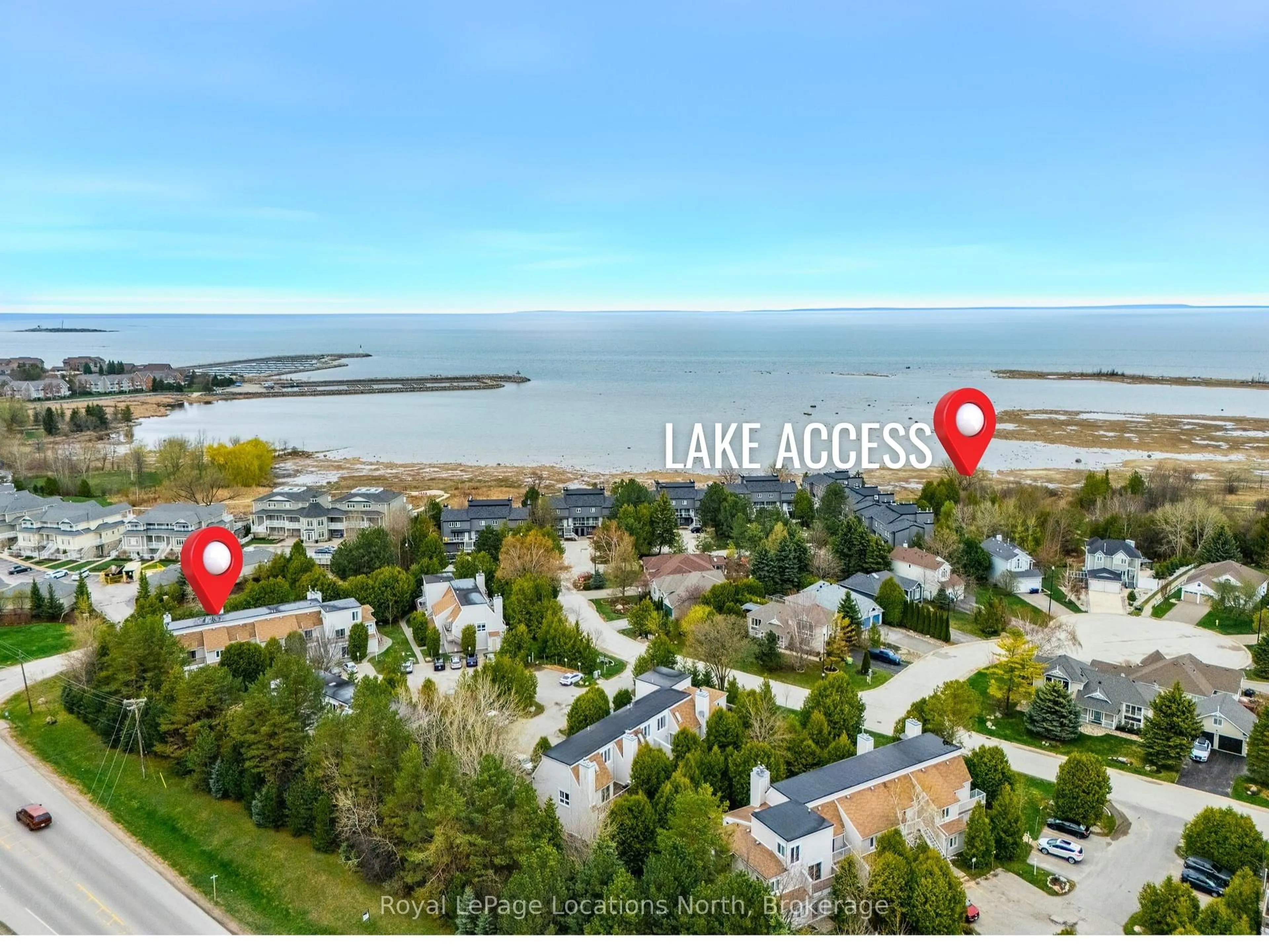 A pic from outside/outdoor area/front of a property/back of a property/a pic from drone, water/lake/river/ocean view for 49 TROTT Blvd #190, Collingwood Ontario L9Y 5B8