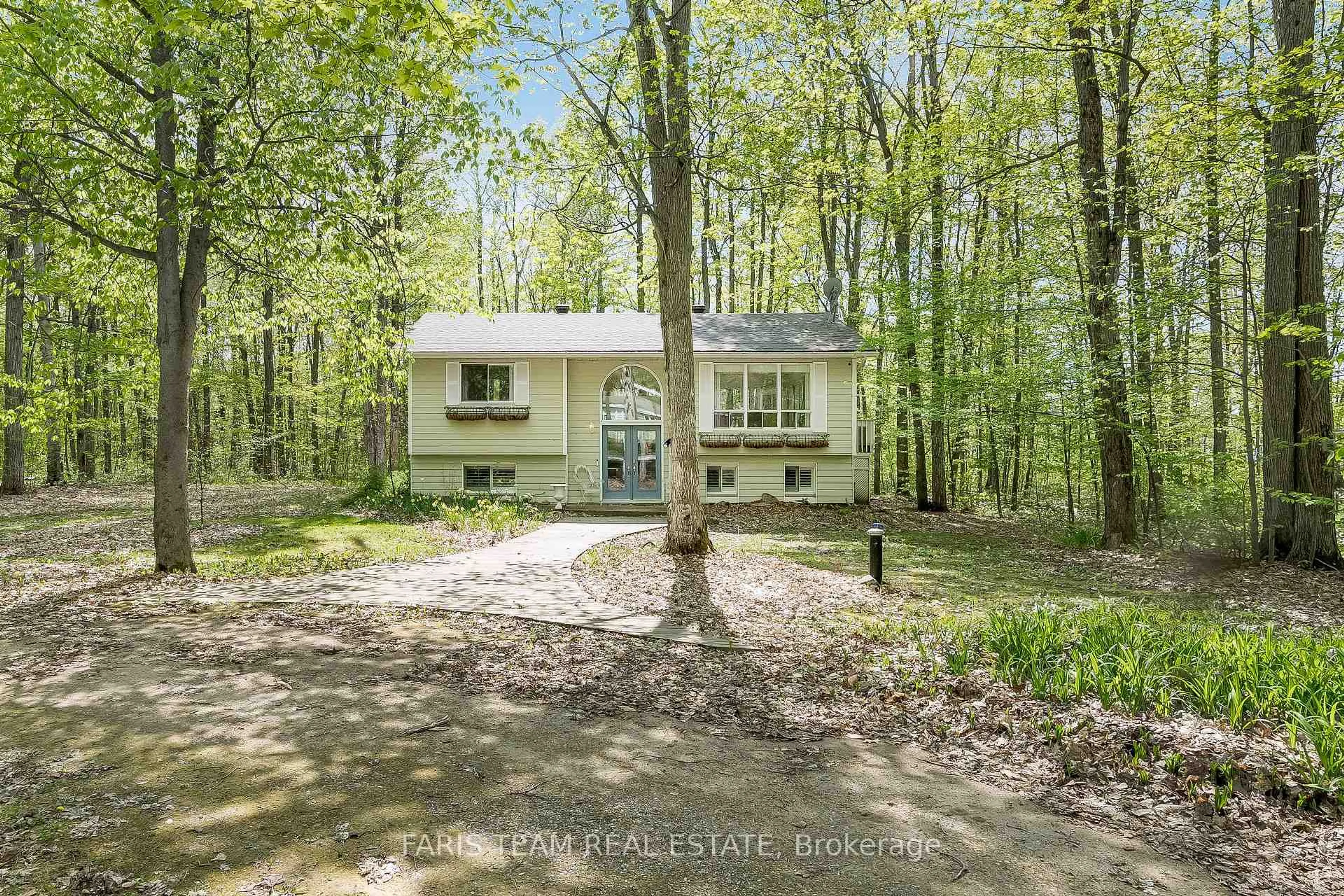 A pic from outside/outdoor area/front of a property/back of a property/a pic from drone, forest/trees view for 104 Silver Birch Dr, Tiny Ontario L9M 0M6