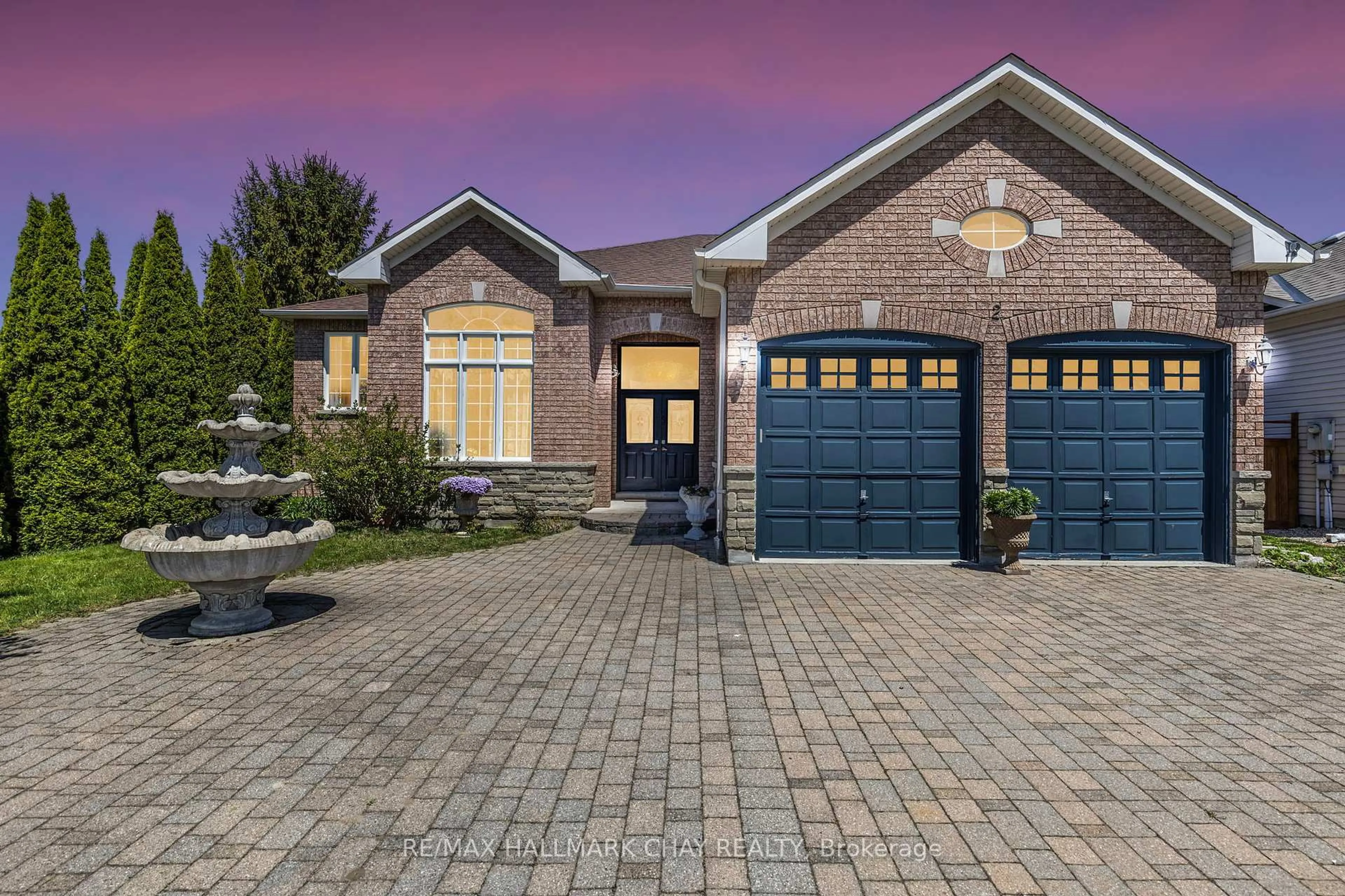 Home with brick exterior material, street for 2 Old Hickory Lane, Wasaga Beach Ontario L9Z 3A9
