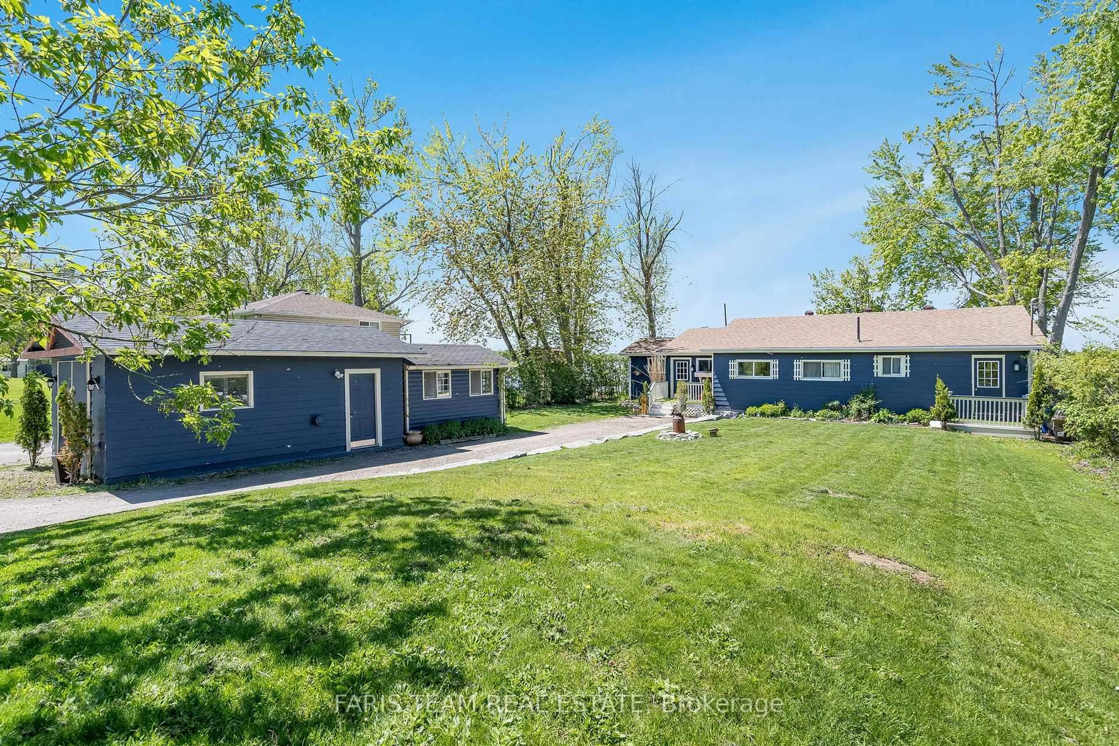 A pic from outside/outdoor area/front of a property/back of a property/a pic from drone, street for 6238 Bluebird St, Ramara Ontario L3V 0K6