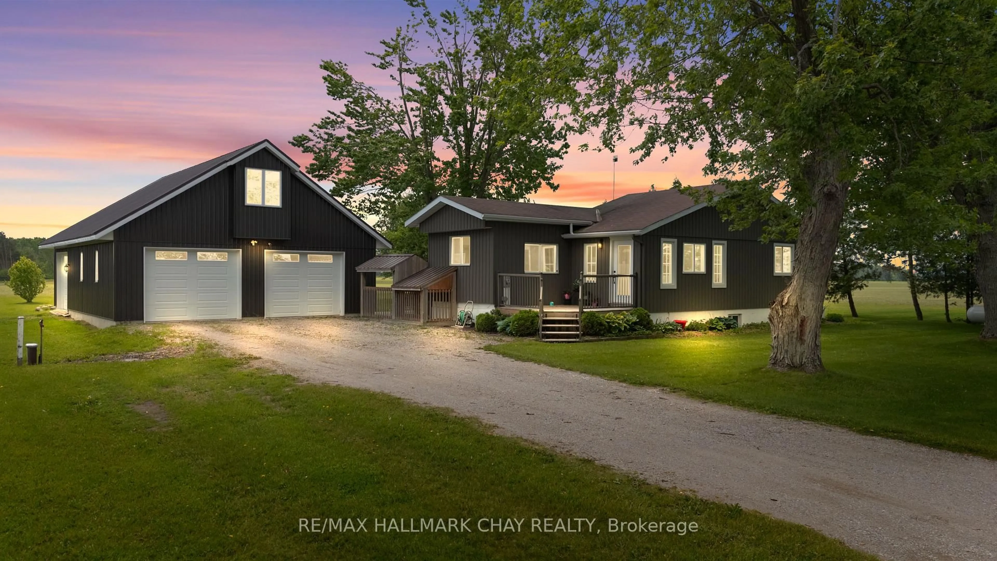 Home with vinyl exterior material, street for 2533 Flos 3 Rd, Springwater Ontario L0L 2K0