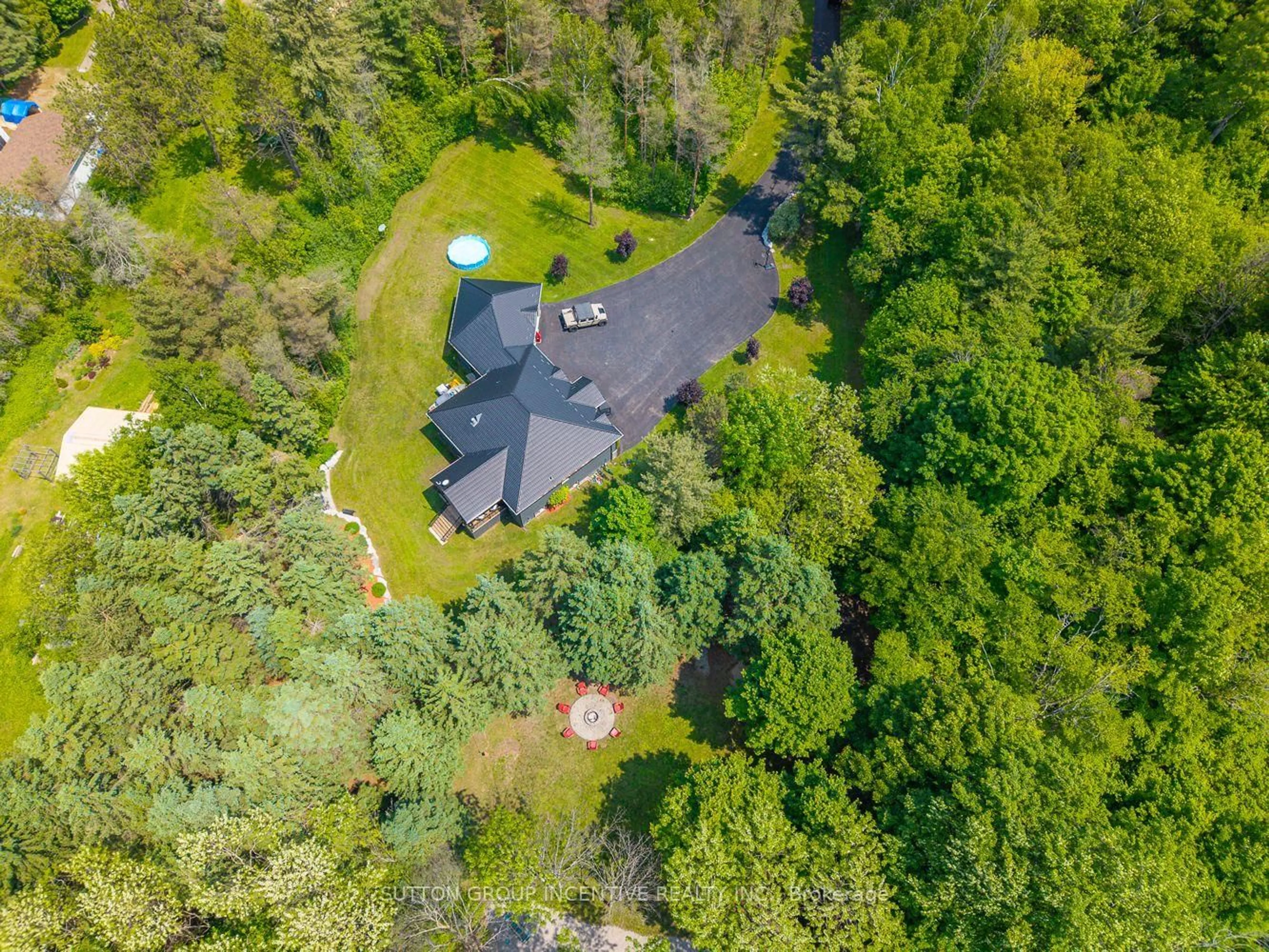 A pic from outside/outdoor area/front of a property/back of a property/a pic from drone, forest/trees view for 7070 93 Highway, Tiny Ontario L0K 2E0