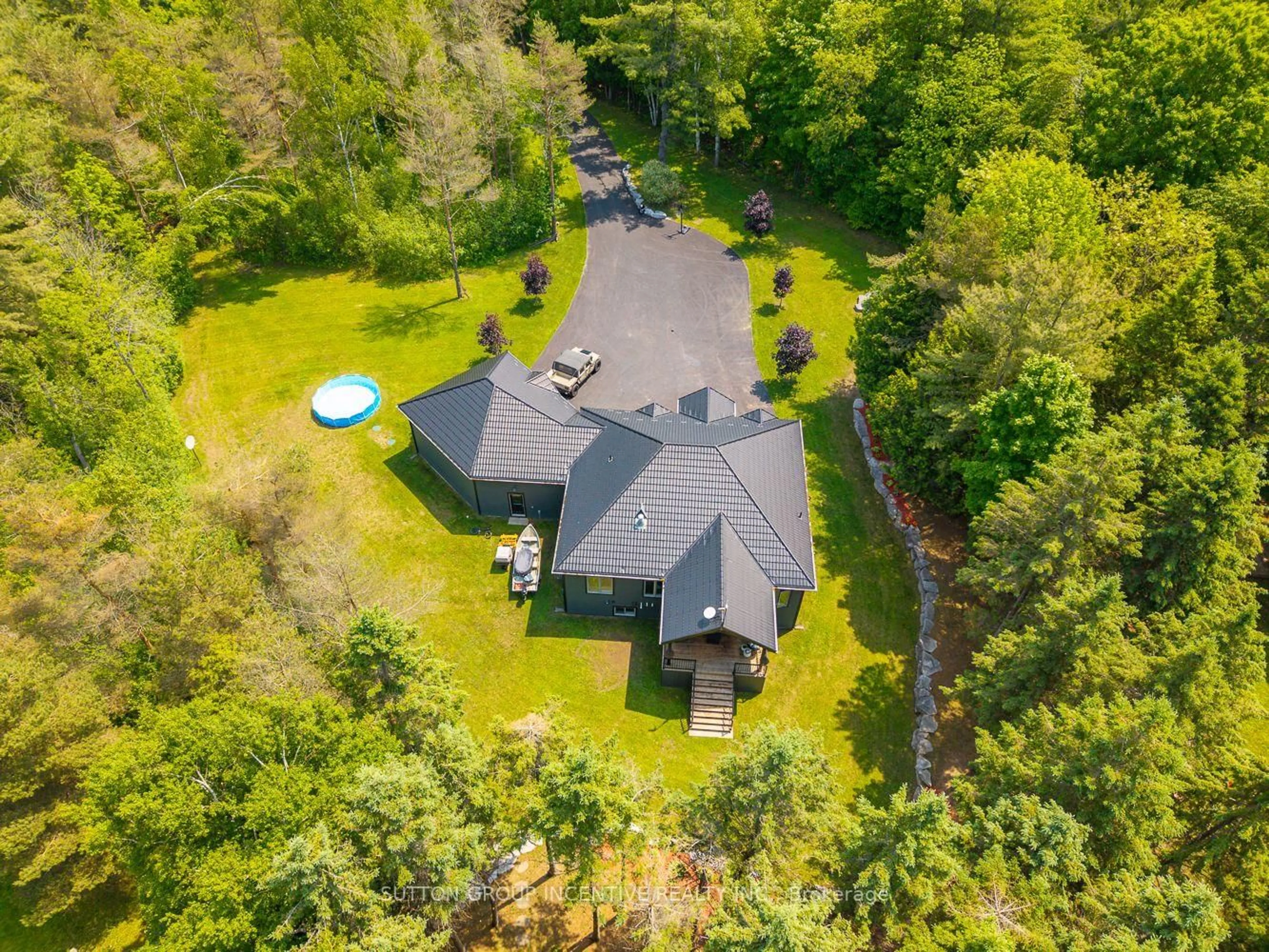 A pic from outside/outdoor area/front of a property/back of a property/a pic from drone, unknown for 7070 93 Highway, Tiny Ontario L0K 2E0