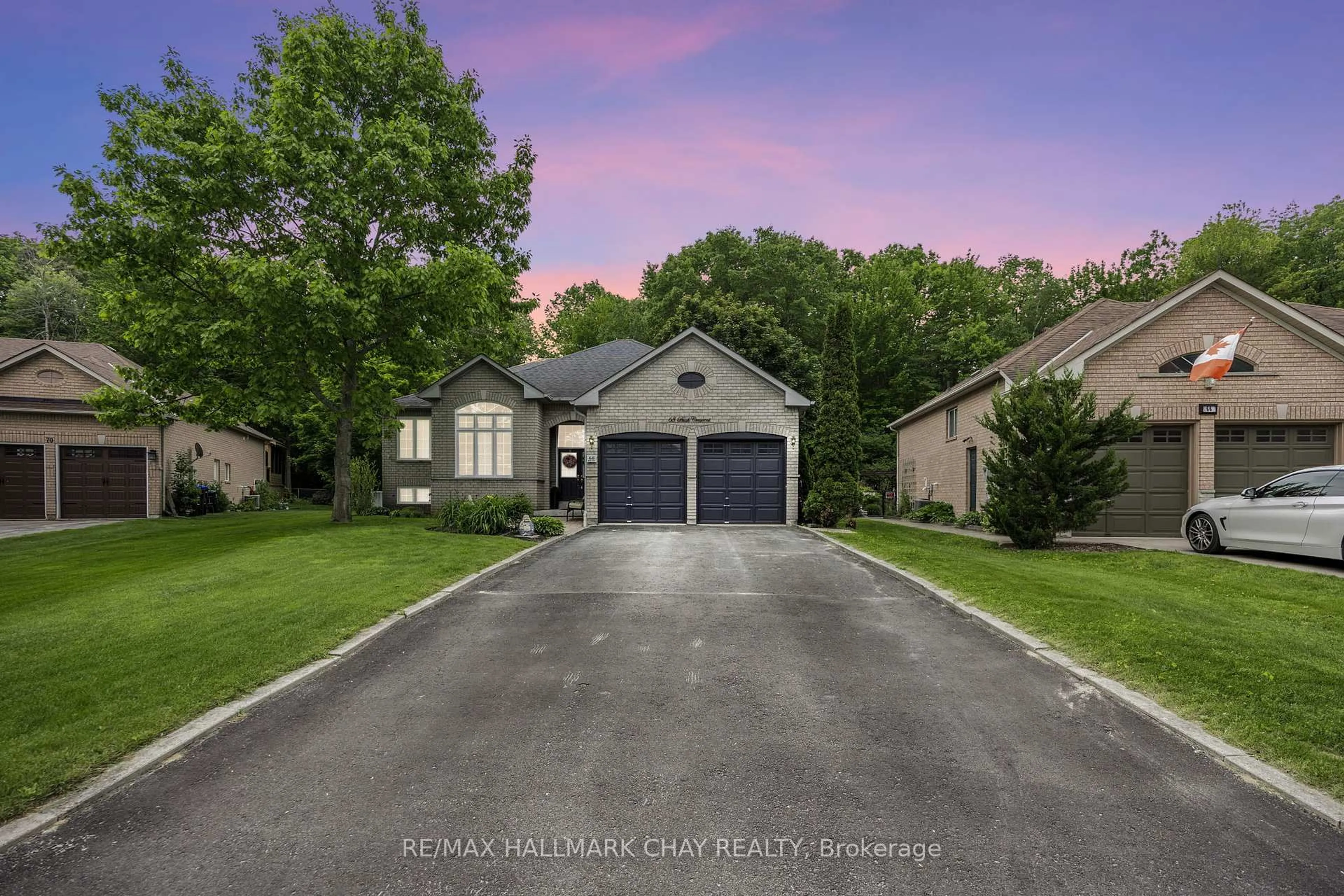 A pic from outside/outdoor area/front of a property/back of a property/a pic from drone, street for 68 Bush Cres, Wasaga Beach Ontario L9Z 1N1
