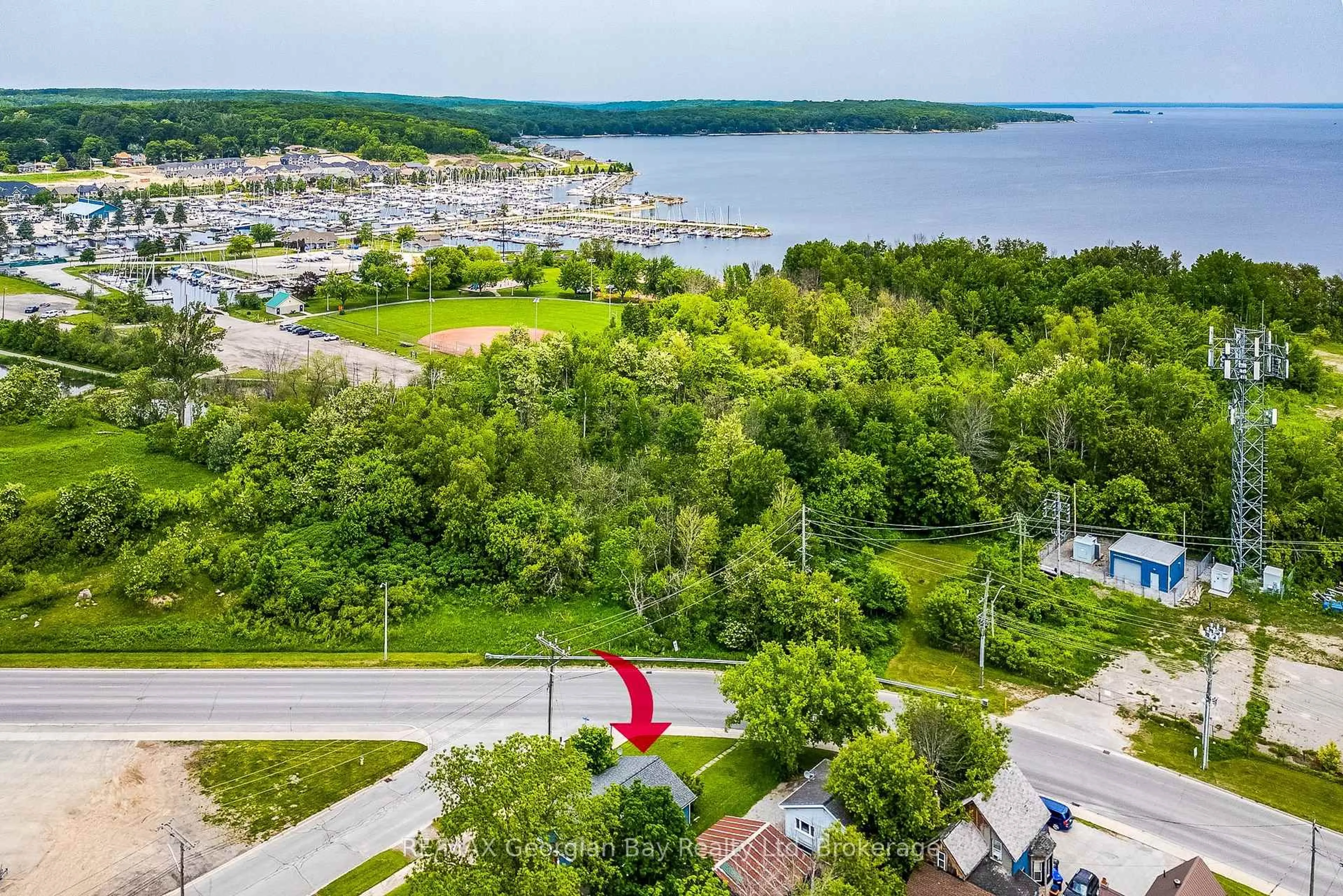 A pic from outside/outdoor area/front of a property/back of a property/a pic from drone, water/lake/river/ocean view for 42 Fourth St, Midland Ontario L4R 3S8