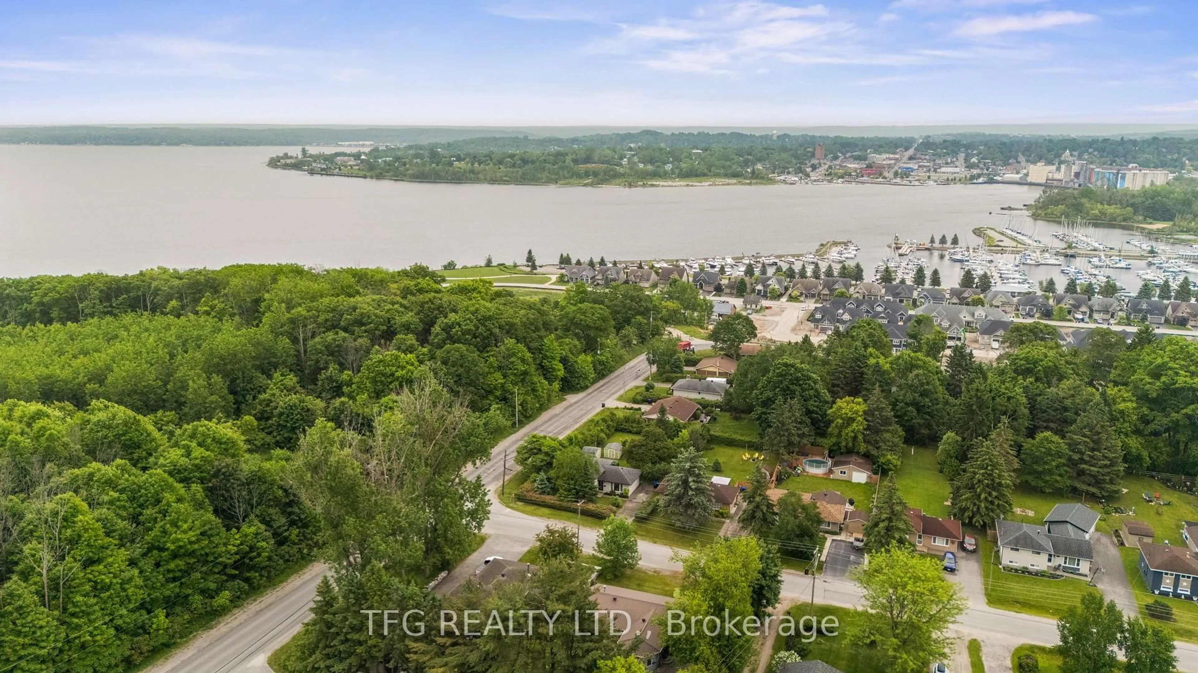 A pic from outside/outdoor area/front of a property/back of a property/a pic from drone, water/lake/river/ocean view for 1005 Everton Rd, Midland Ontario L4R 5H7