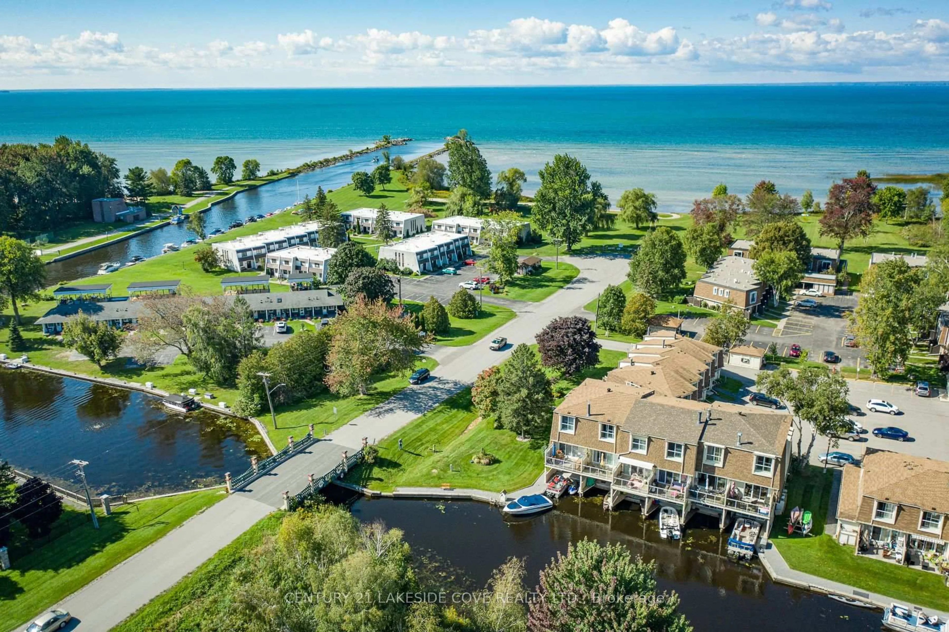 A pic from outside/outdoor area/front of a property/back of a property/a pic from drone, water/lake/river/ocean view for 4 Paradise Blvd #Unit 5, Ramara Ontario L0K 1B0