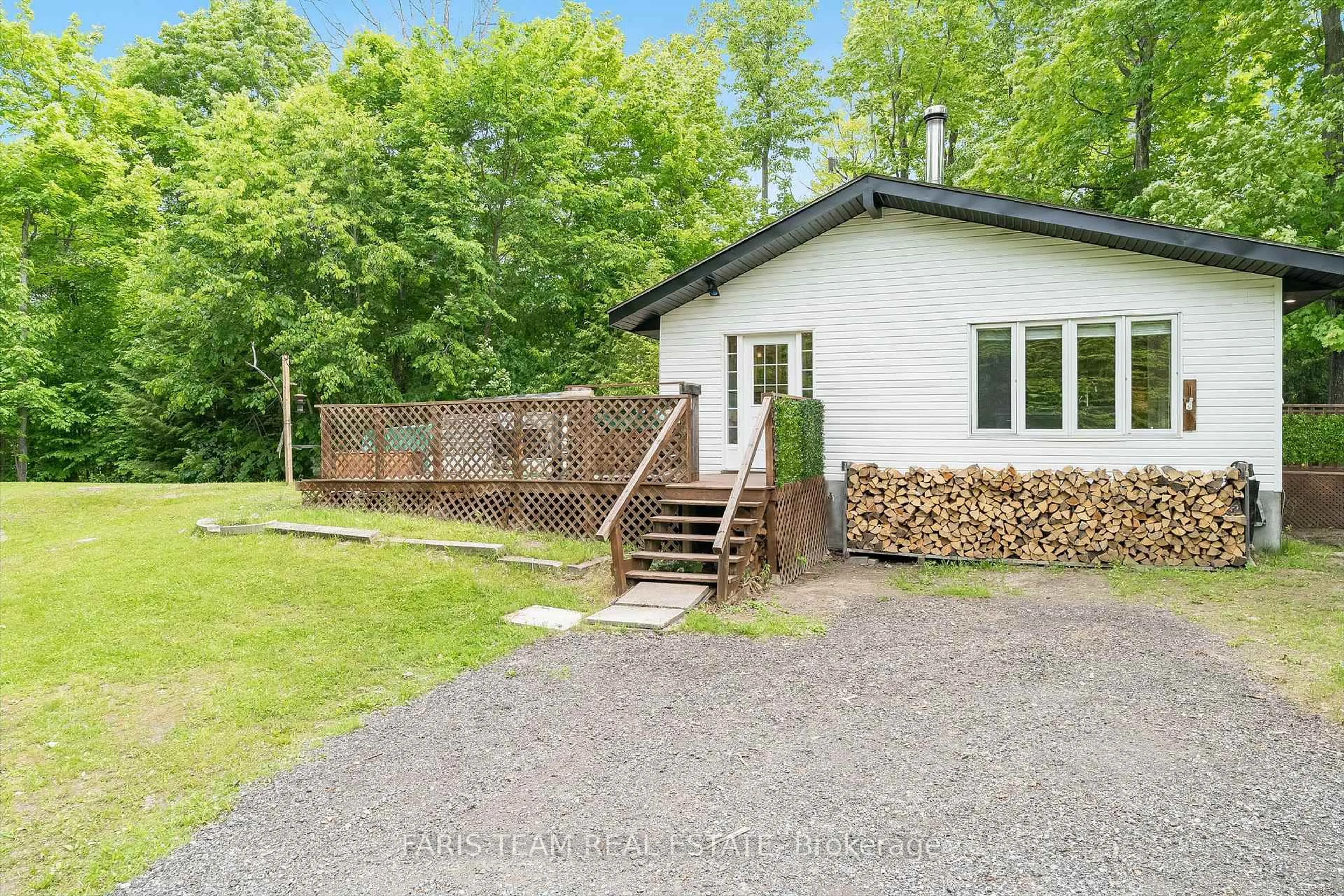 A pic from outside/outdoor area/front of a property/back of a property/a pic from drone, forest/trees view for 56 Meadows Ave, Tay Ontario L0L 2J0