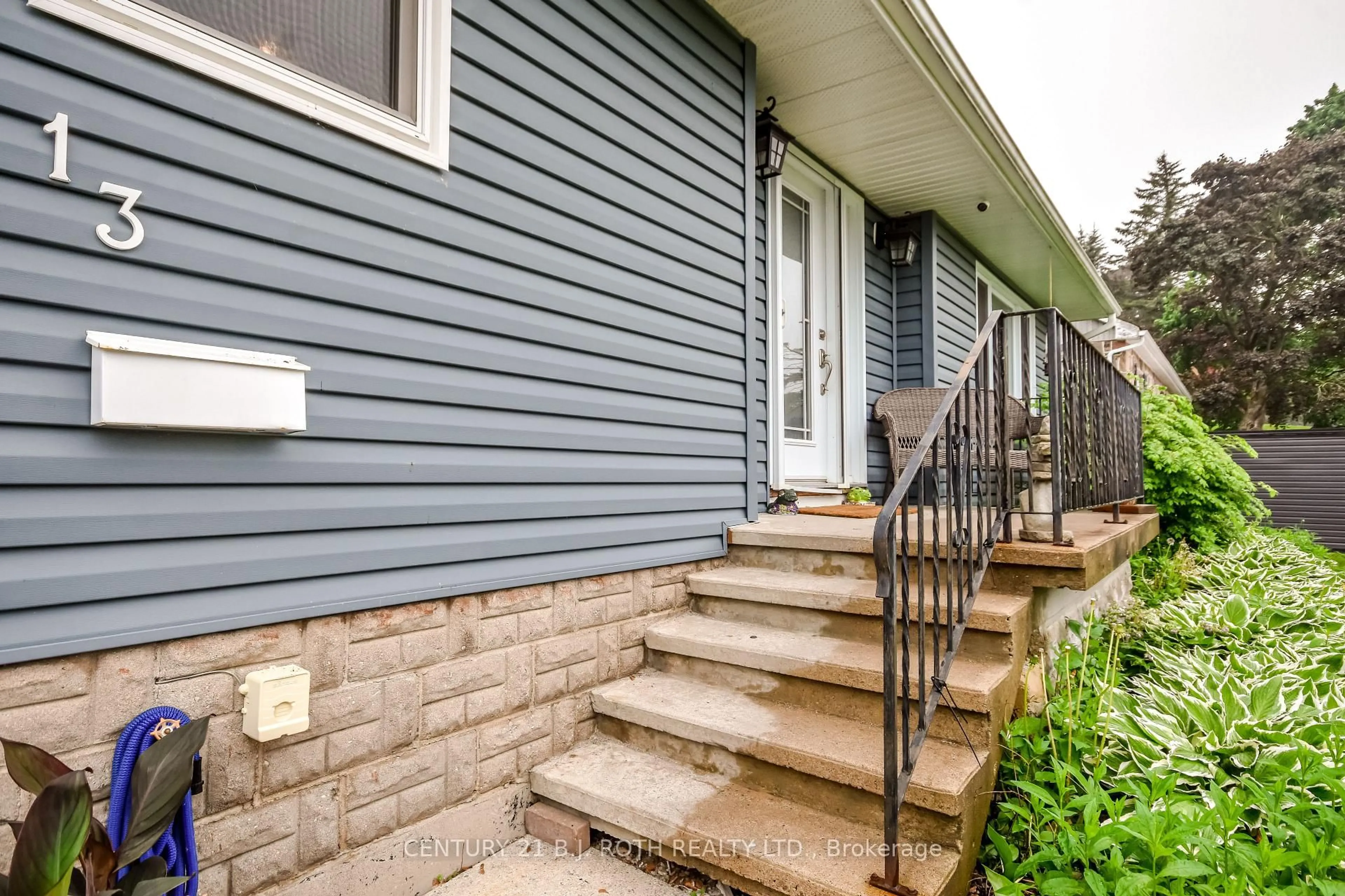 Home with vinyl exterior material, street for 13 Fitton Hts, Orillia Ontario L3V 4M7