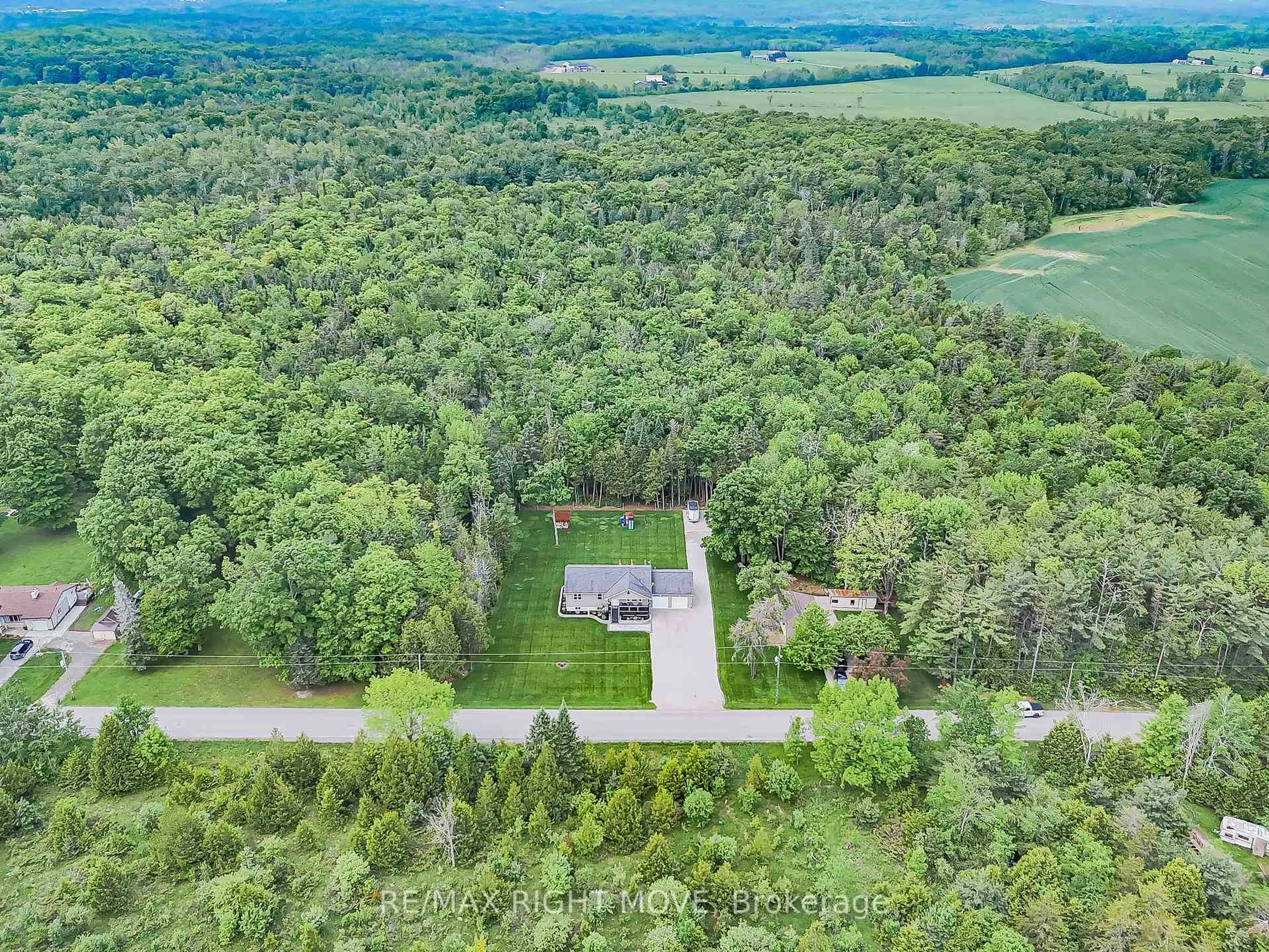 A pic from outside/outdoor area/front of a property/back of a property/a pic from drone, forest/trees view for 1968 Balkwill Line, Severn Ontario L0K 1E0