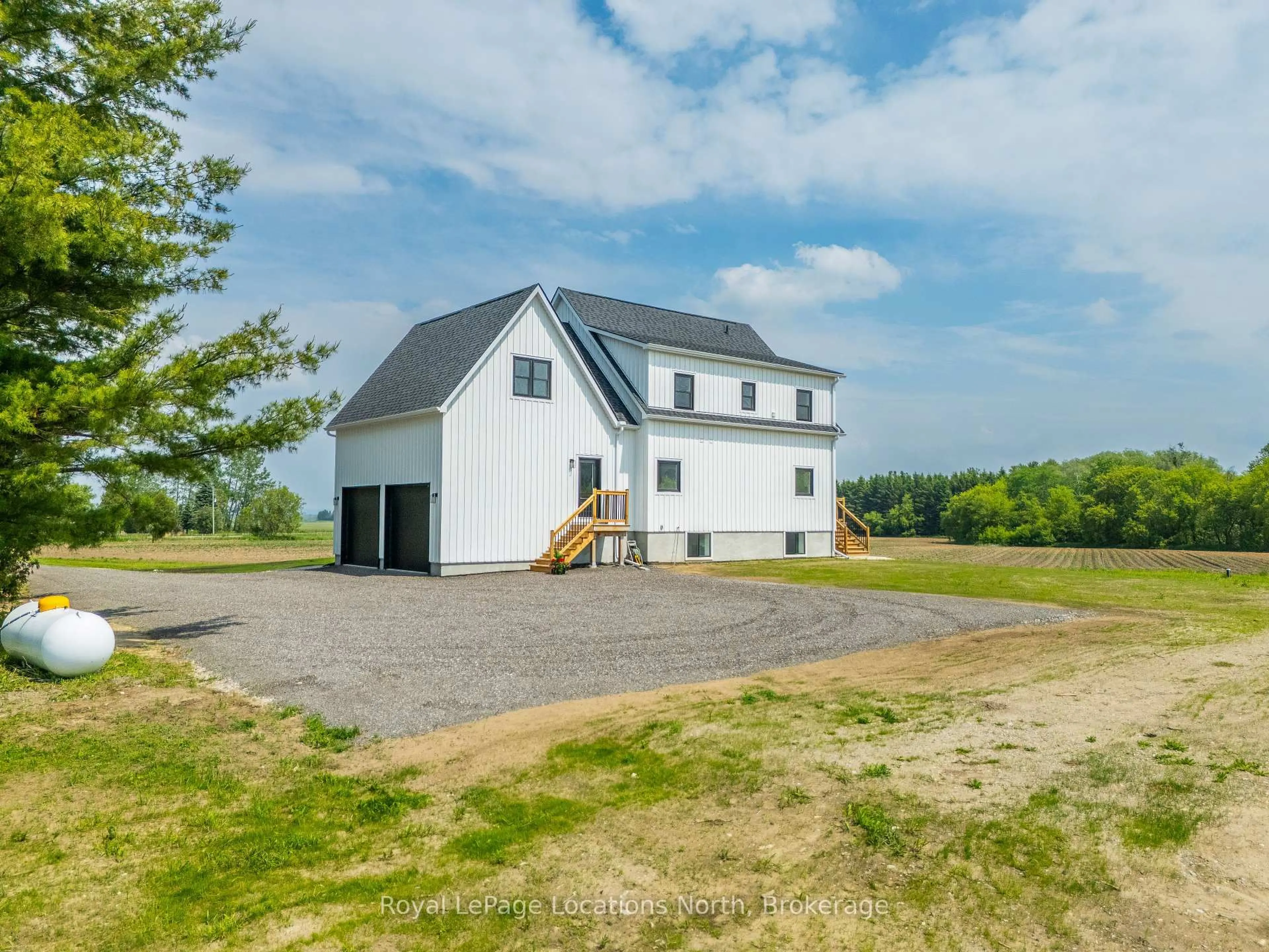 A pic from outside/outdoor area/front of a property/back of a property/a pic from drone, unknown for 10906 County Road 10, Clearview Ontario L0M 1N0