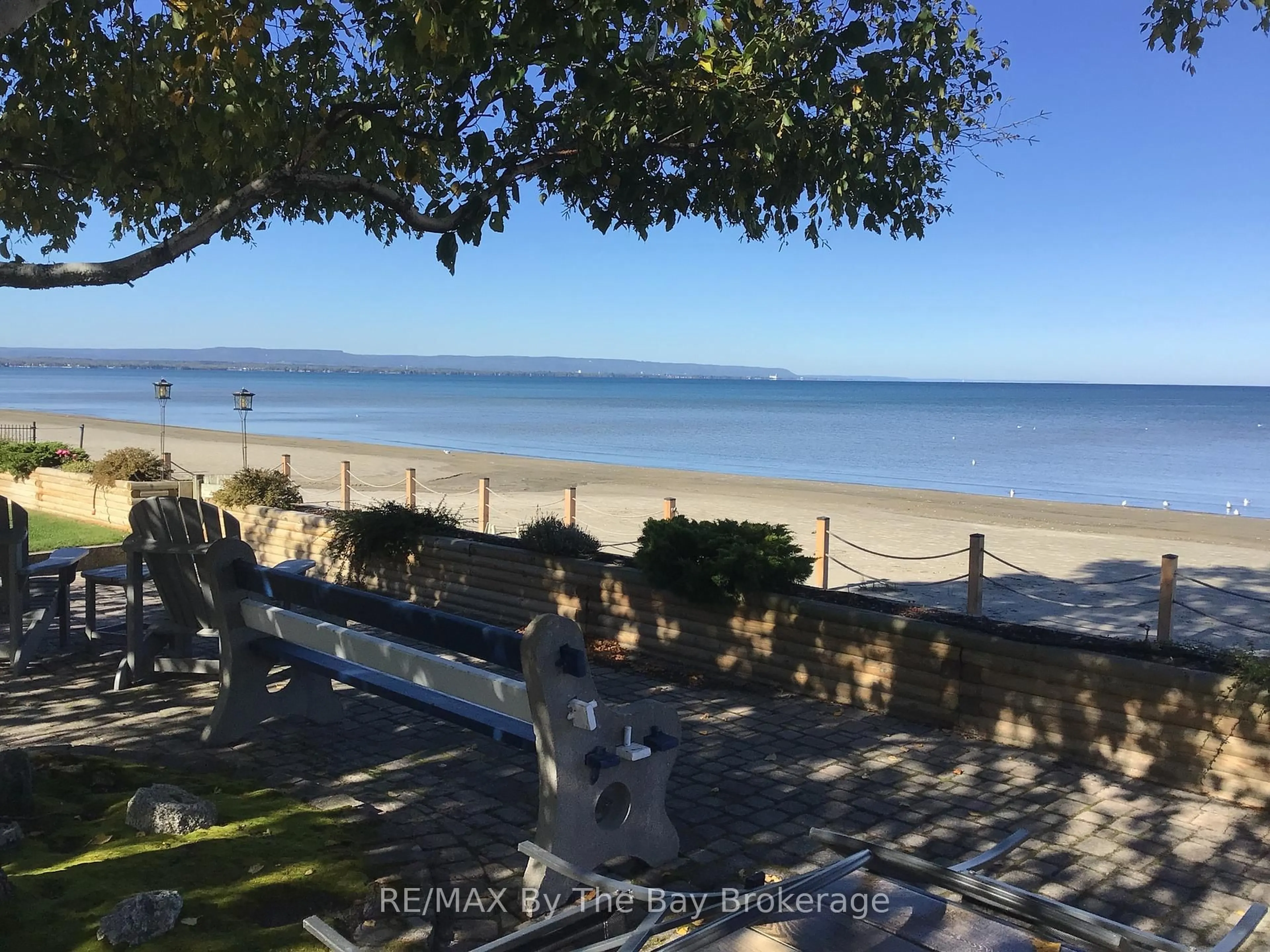 A pic from outside/outdoor area/front of a property/back of a property/a pic from drone, water/lake/river/ocean view for 5 29th St #3, Wasaga Beach Ontario L9Z 2E1