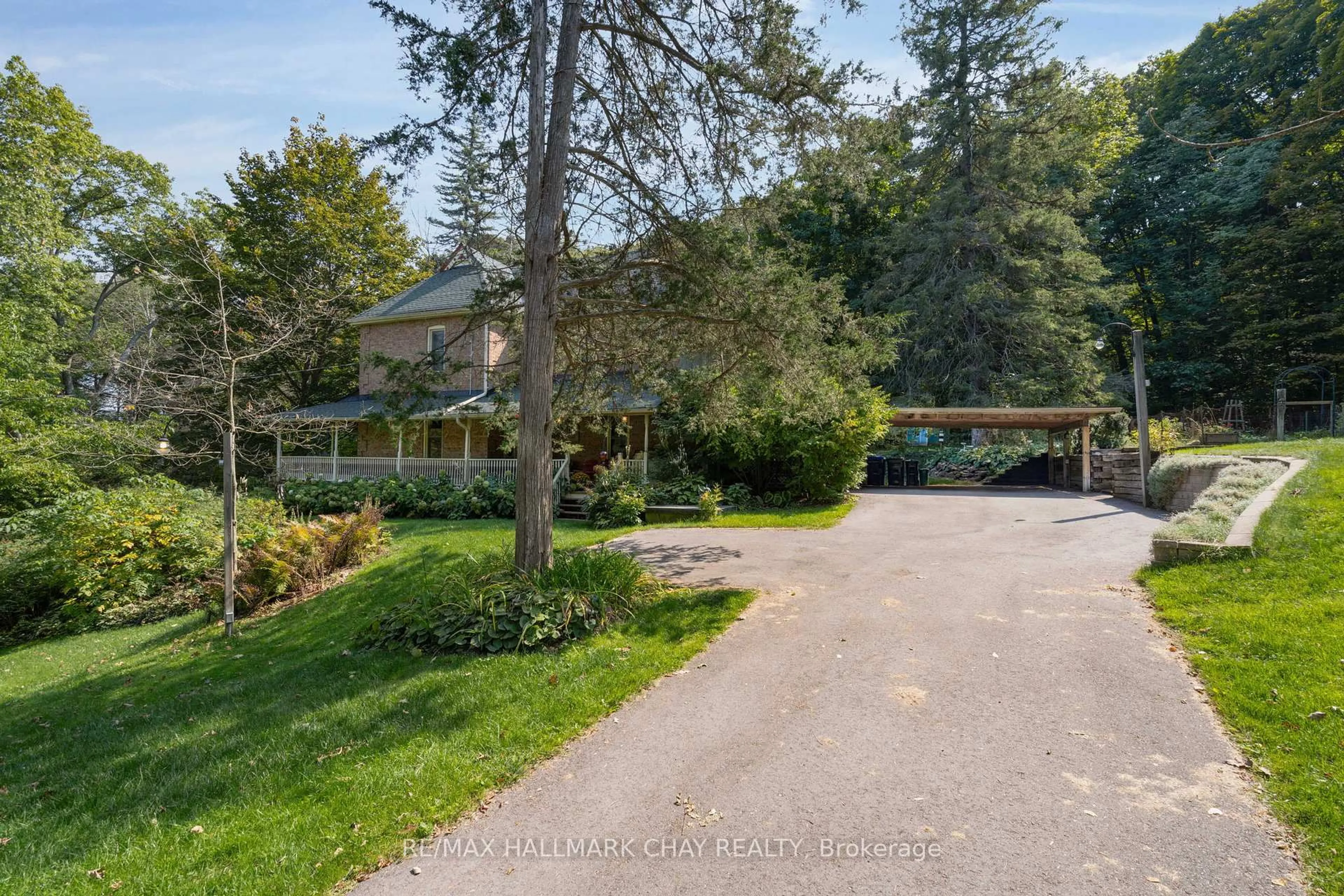 A pic from outside/outdoor area/front of a property/back of a property/a pic from drone, street for 4950 Penetanguishene Rd, Springwater Ontario L0L 1V0
