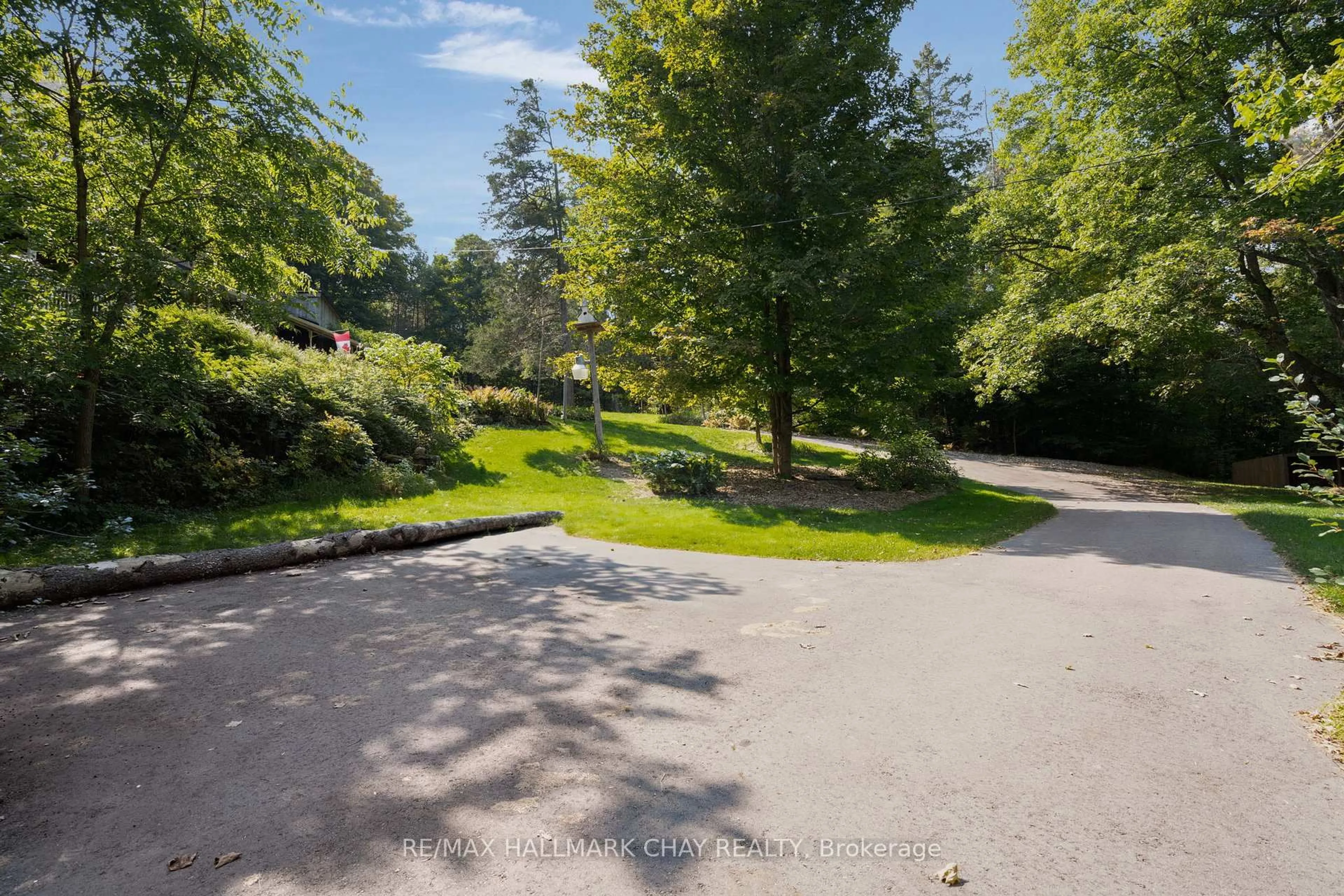 A pic from outside/outdoor area/front of a property/back of a property/a pic from drone, forest/trees view for 4950 Penetanguishene Rd, Springwater Ontario L0L 1V0