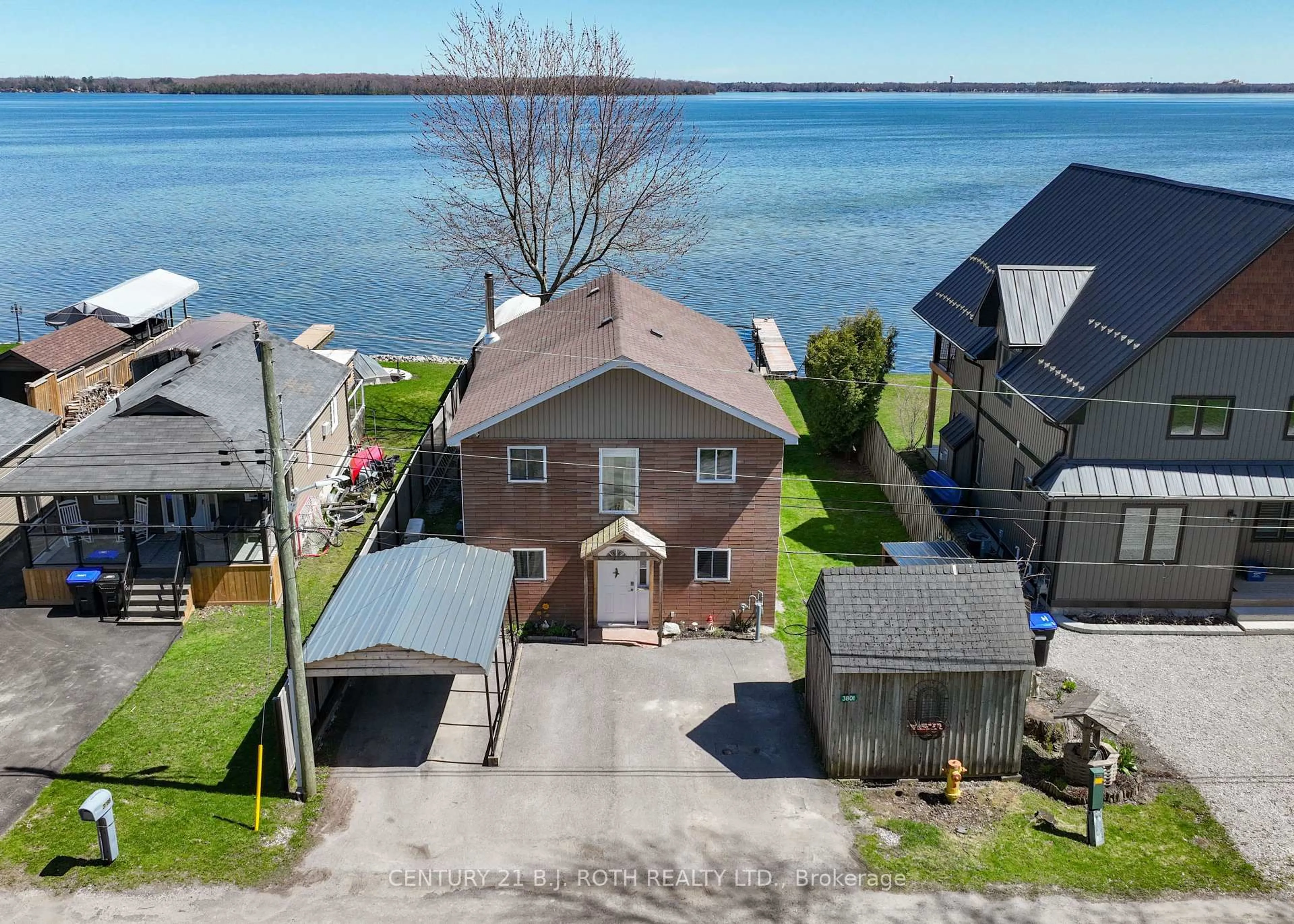 A pic from outside/outdoor area/front of a property/back of a property/a pic from drone, water/lake/river/ocean view for 3801 Wood Ave, Severn Ontario L3V 6H3